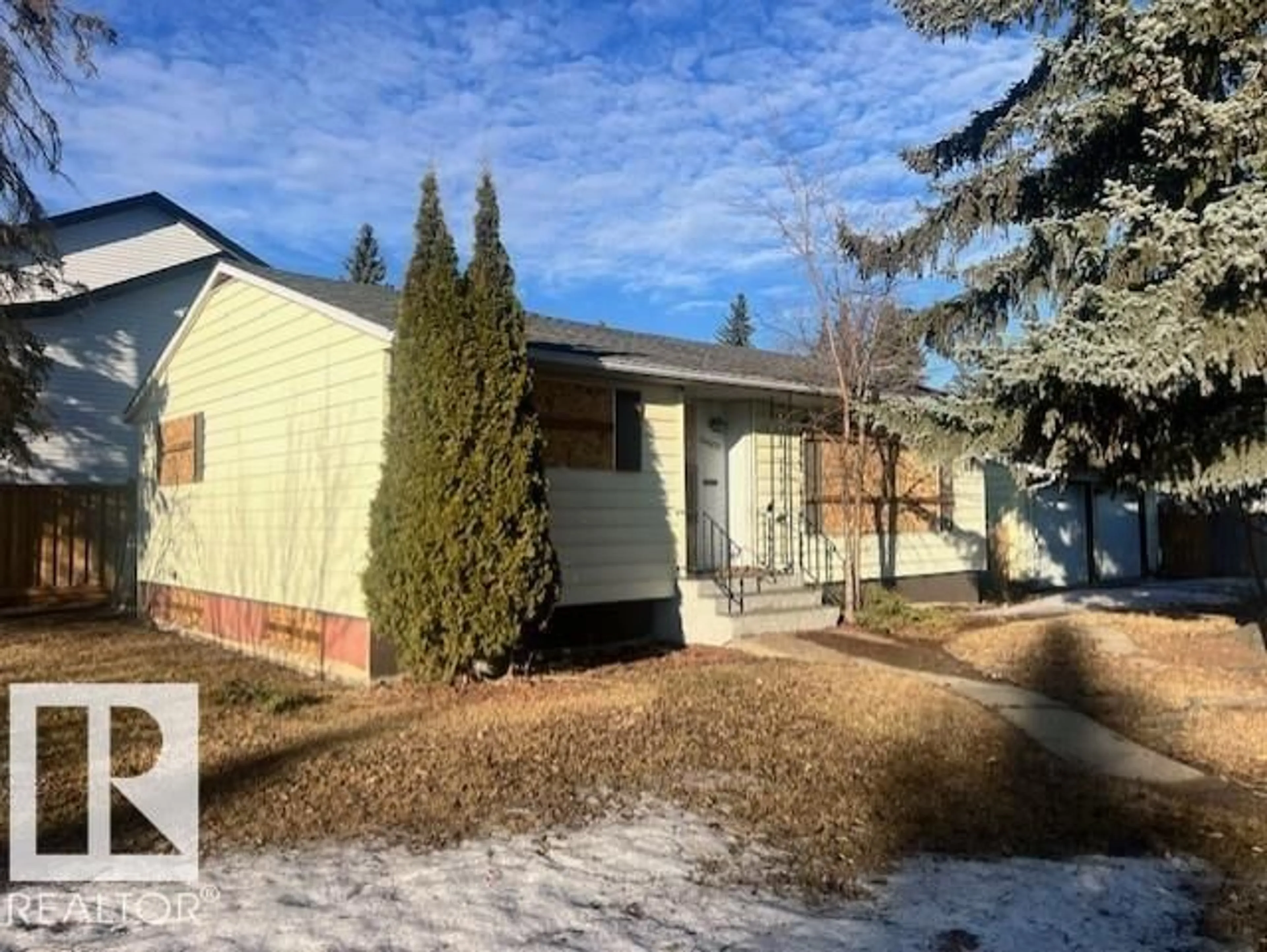 Home with vinyl exterior material, street for 14632 95 AV, Edmonton Alberta T5N0B3