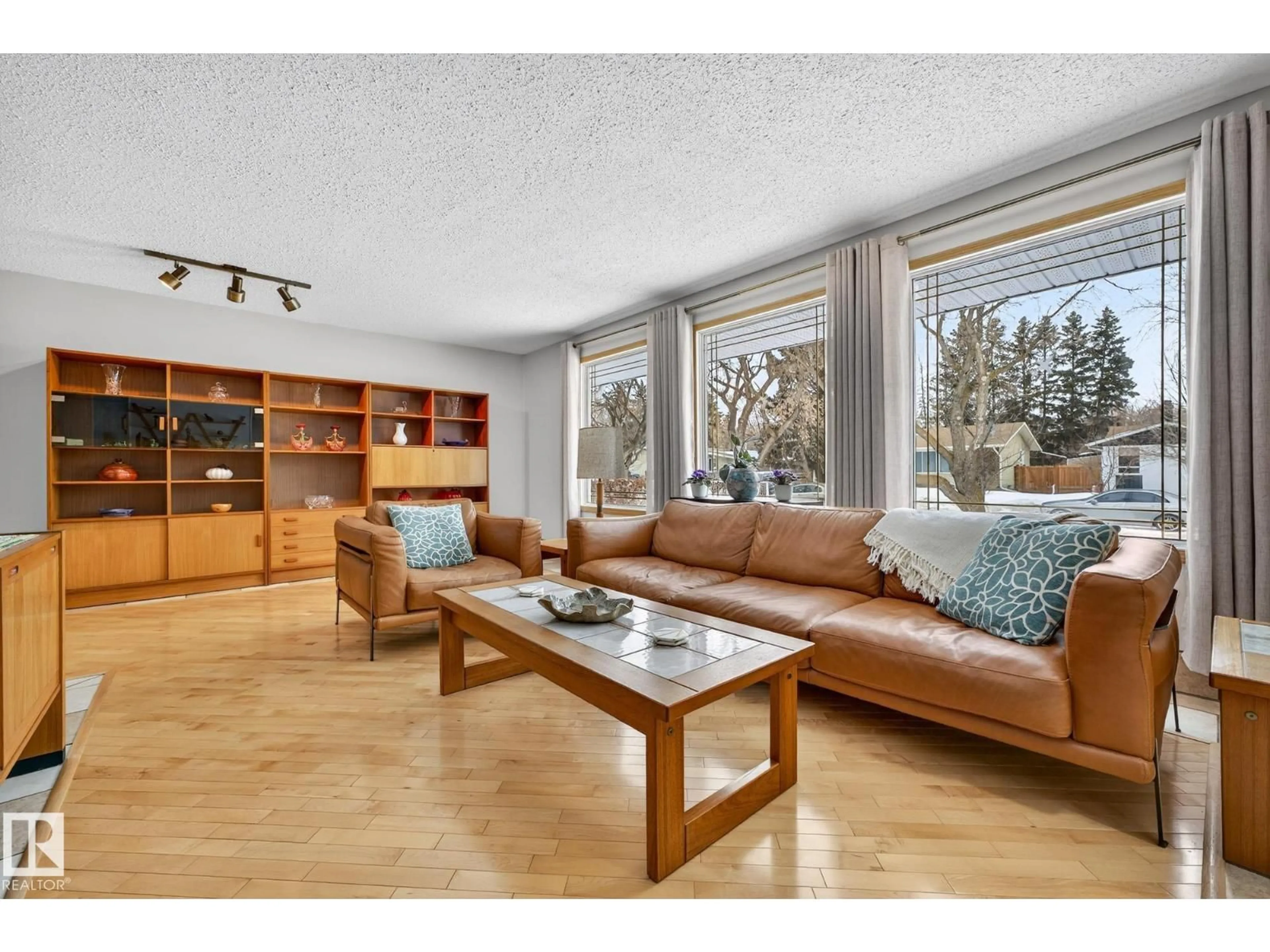 Living room with furniture, wood/laminate floor for 4 ASPEN CR, St. Albert Alberta T8N2L8