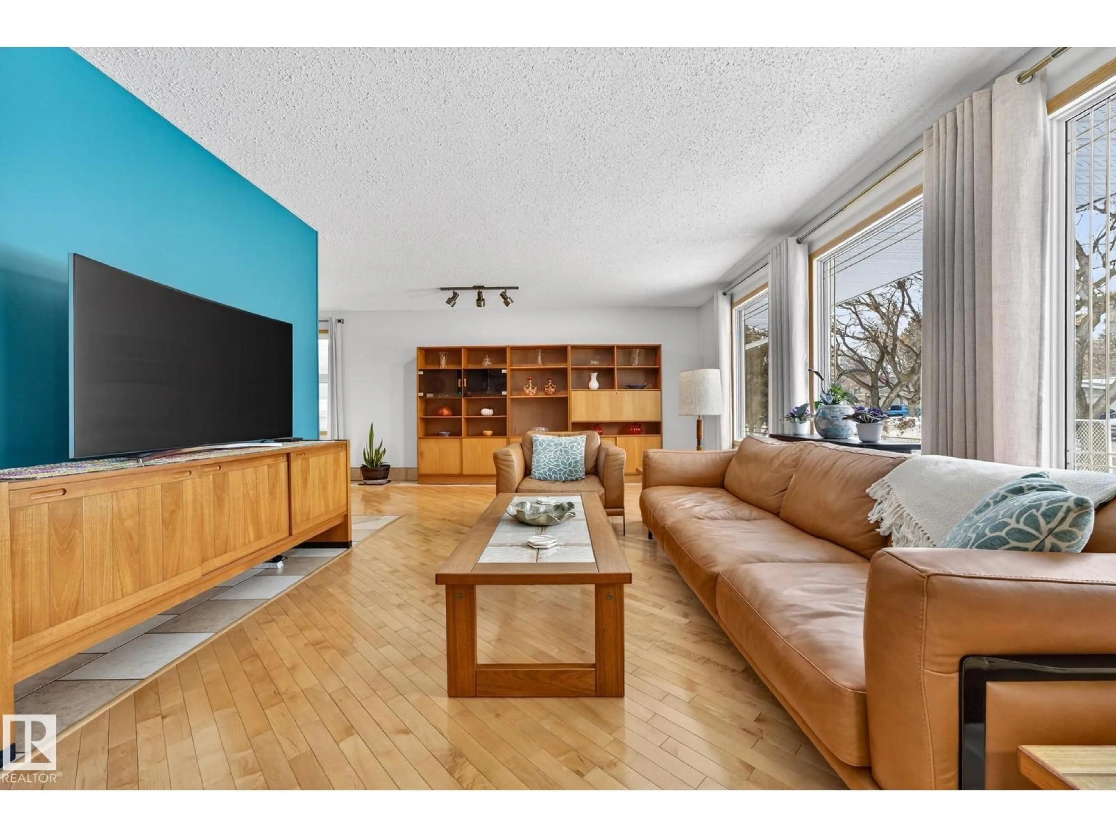 Living room with furniture, wood/laminate floor for 4 ASPEN CR, St. Albert Alberta T8N2L8