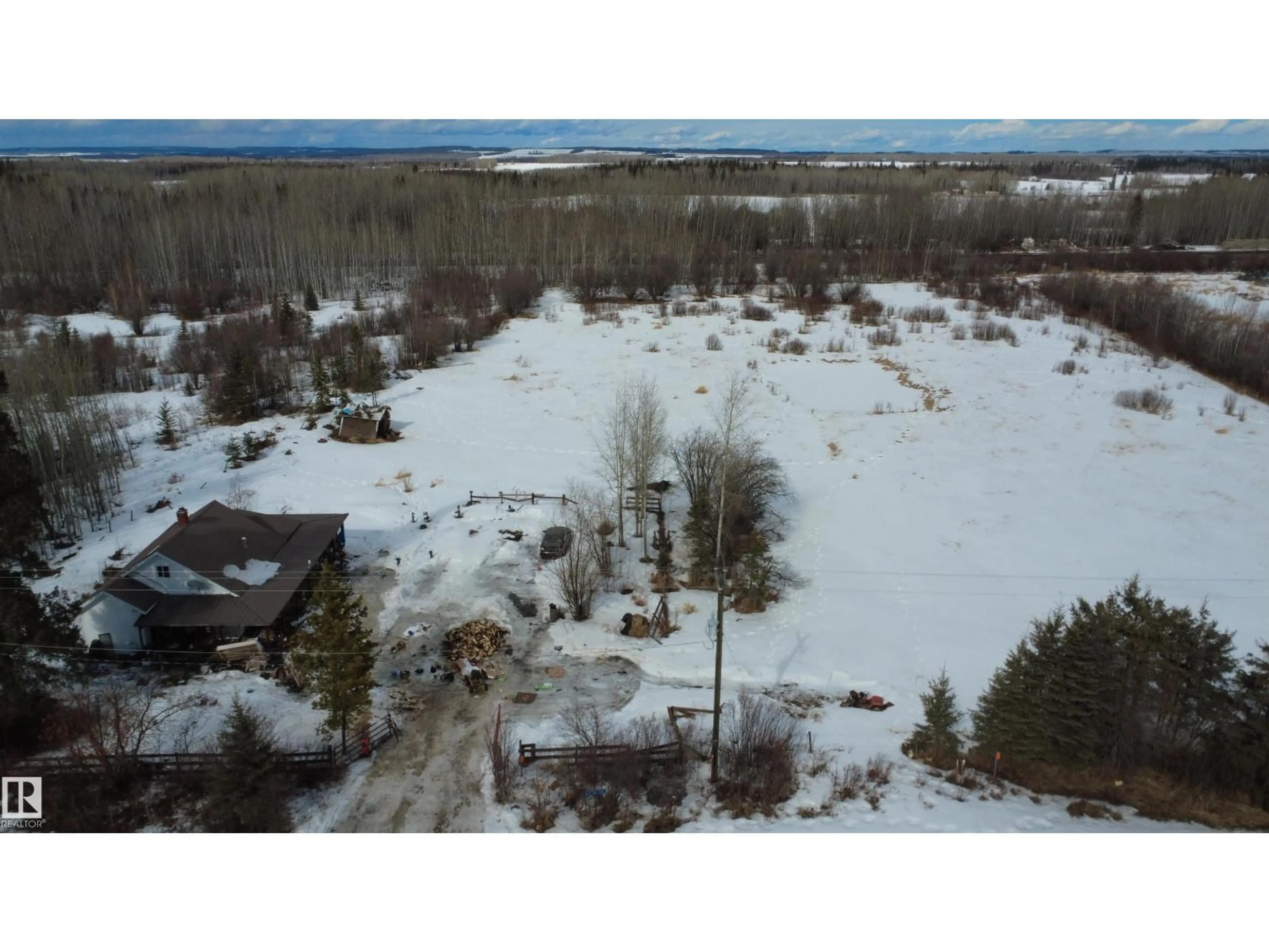 A pic from outside/outdoor area/front of a property/back of a property/a pic from drone, unknown for 9222 HWY 16 X, Rural Yellowhead Alberta T0E2M0