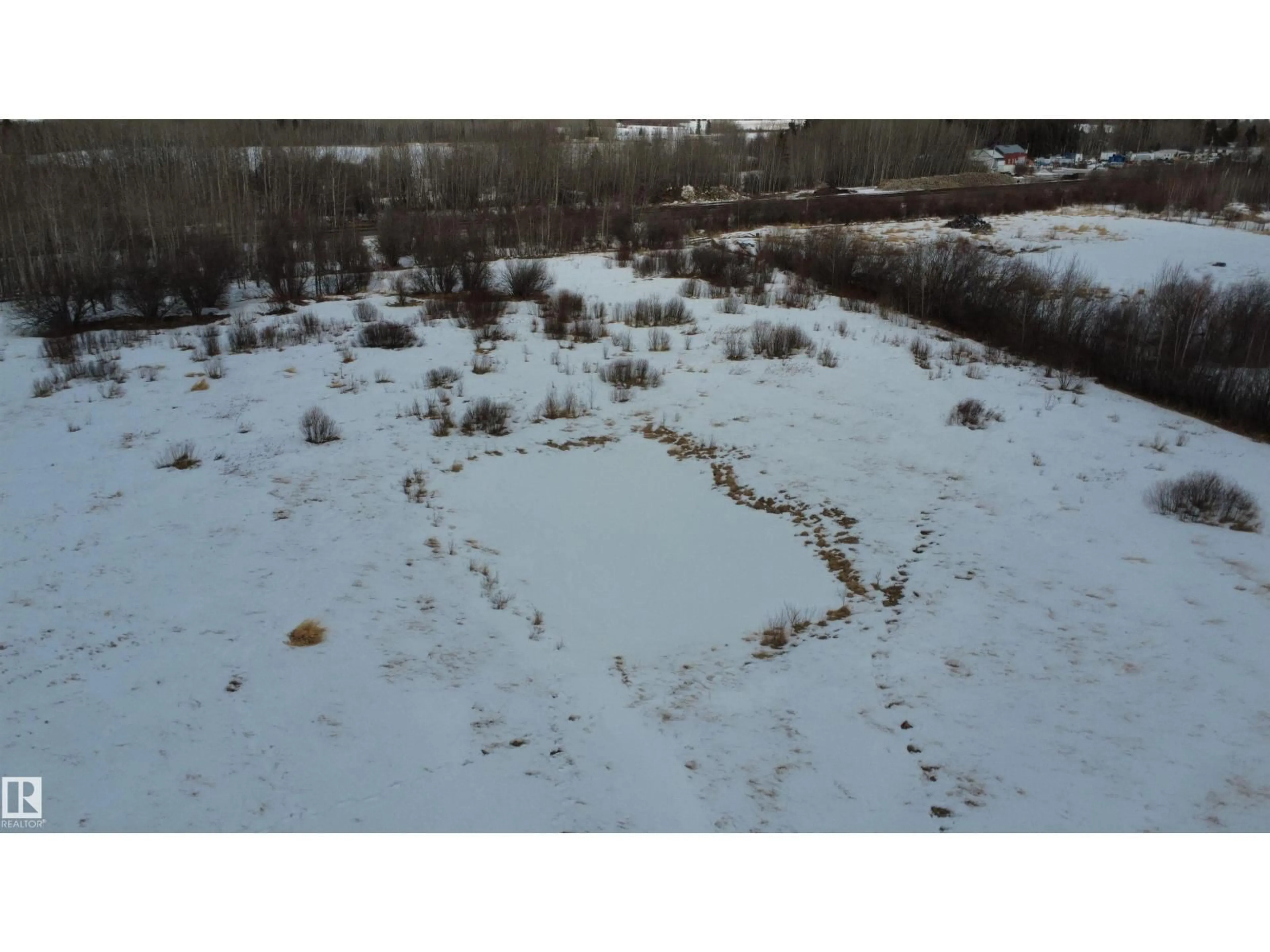 A pic from outside/outdoor area/front of a property/back of a property/a pic from drone, water/lake/river/ocean view for 9222 HWY 16 X, Rural Yellowhead Alberta T0E2M0