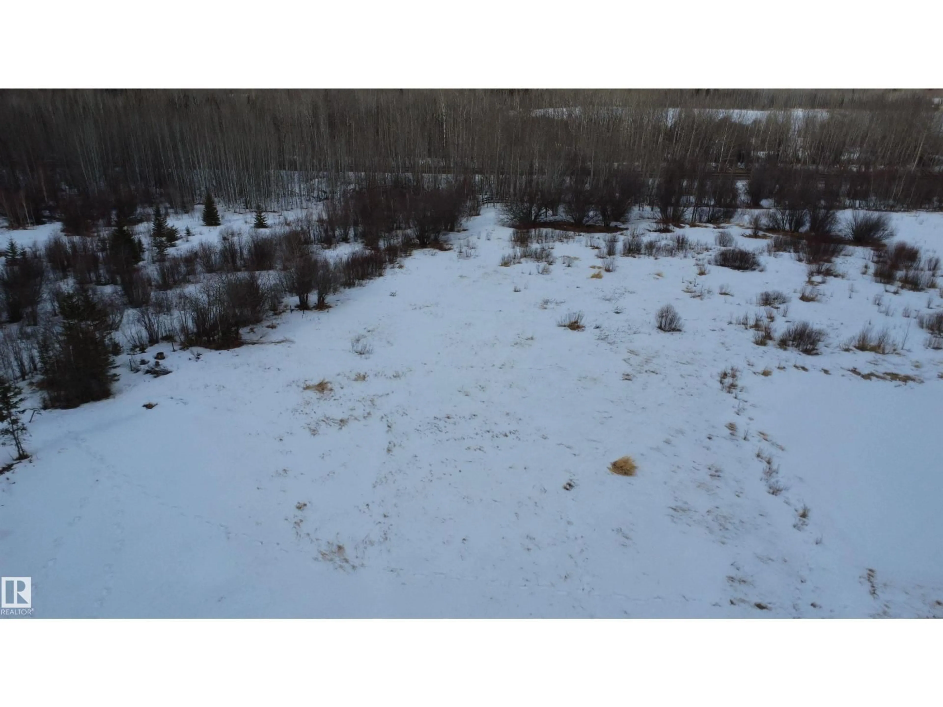 A pic from outside/outdoor area/front of a property/back of a property/a pic from drone, water/lake/river/ocean view for 9222 HWY 16 X, Rural Yellowhead Alberta T0E2M0