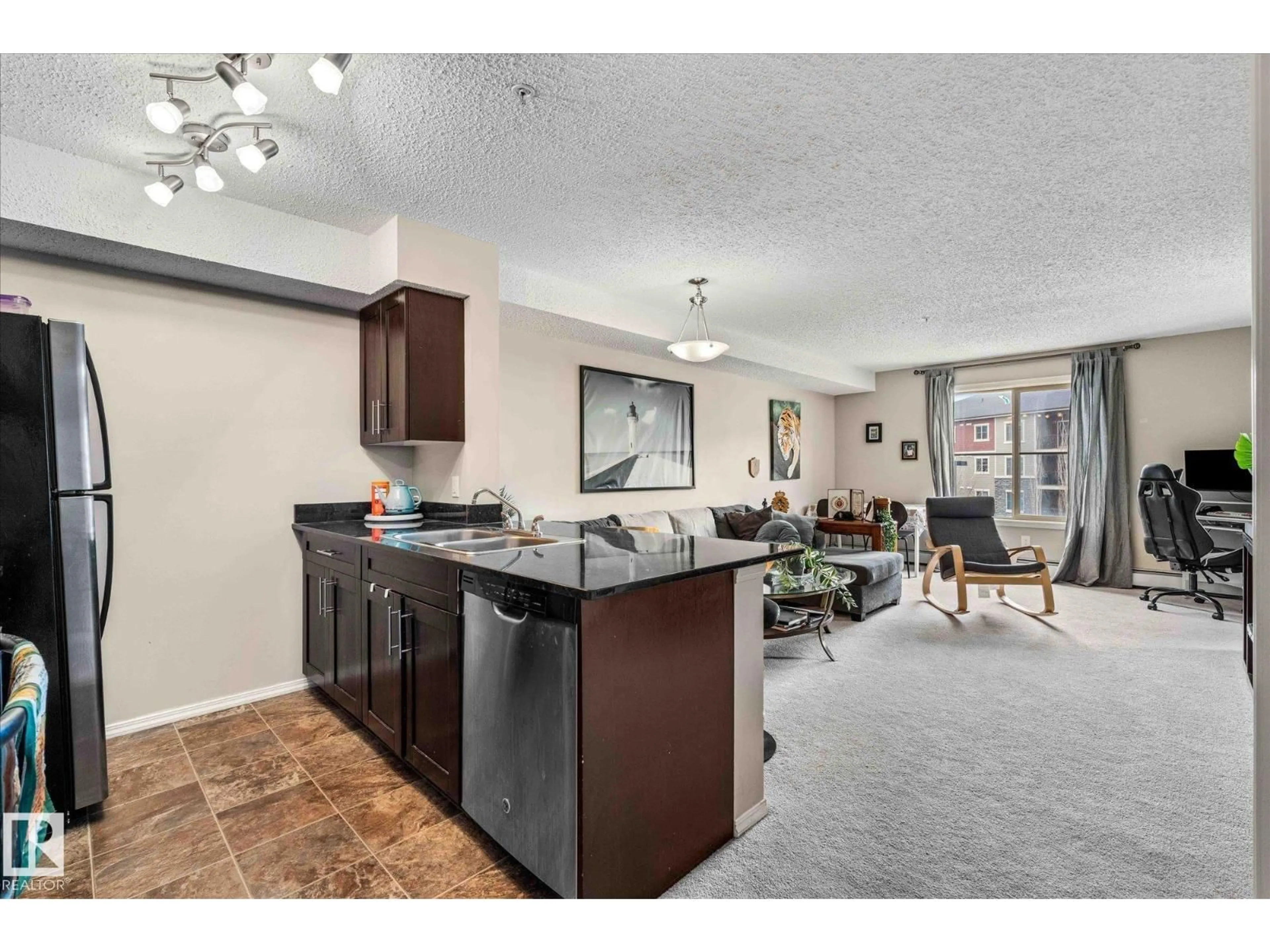 Open concept kitchen, unknown for #309 - 1080 MCCONACHIE BV, Edmonton Alberta T5Y0X2
