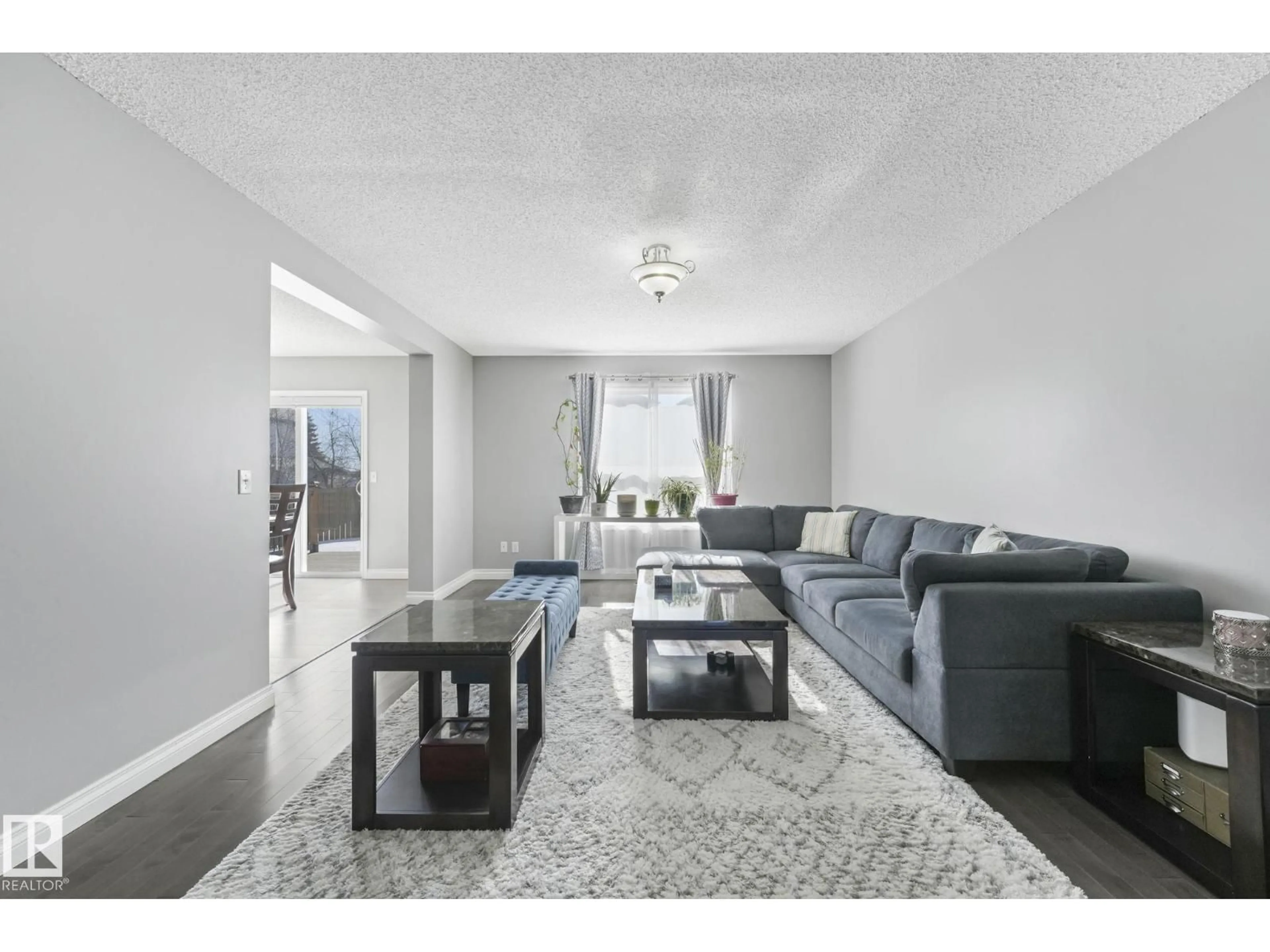 Living room with furniture, unknown for 3504 21 ST, Edmonton Alberta T6T1W3