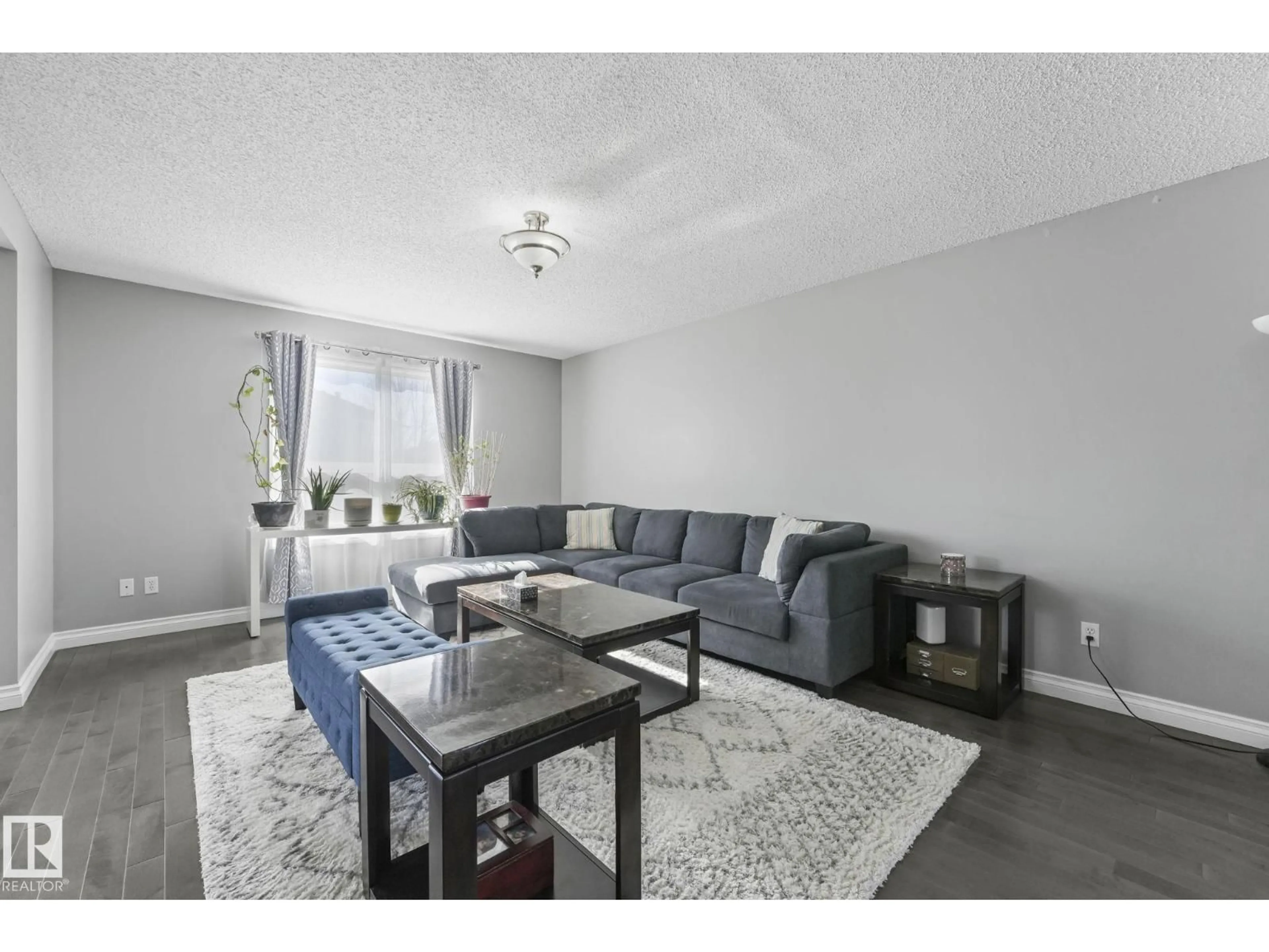 Living room with furniture, unknown for 3504 21 ST, Edmonton Alberta T6T1W3