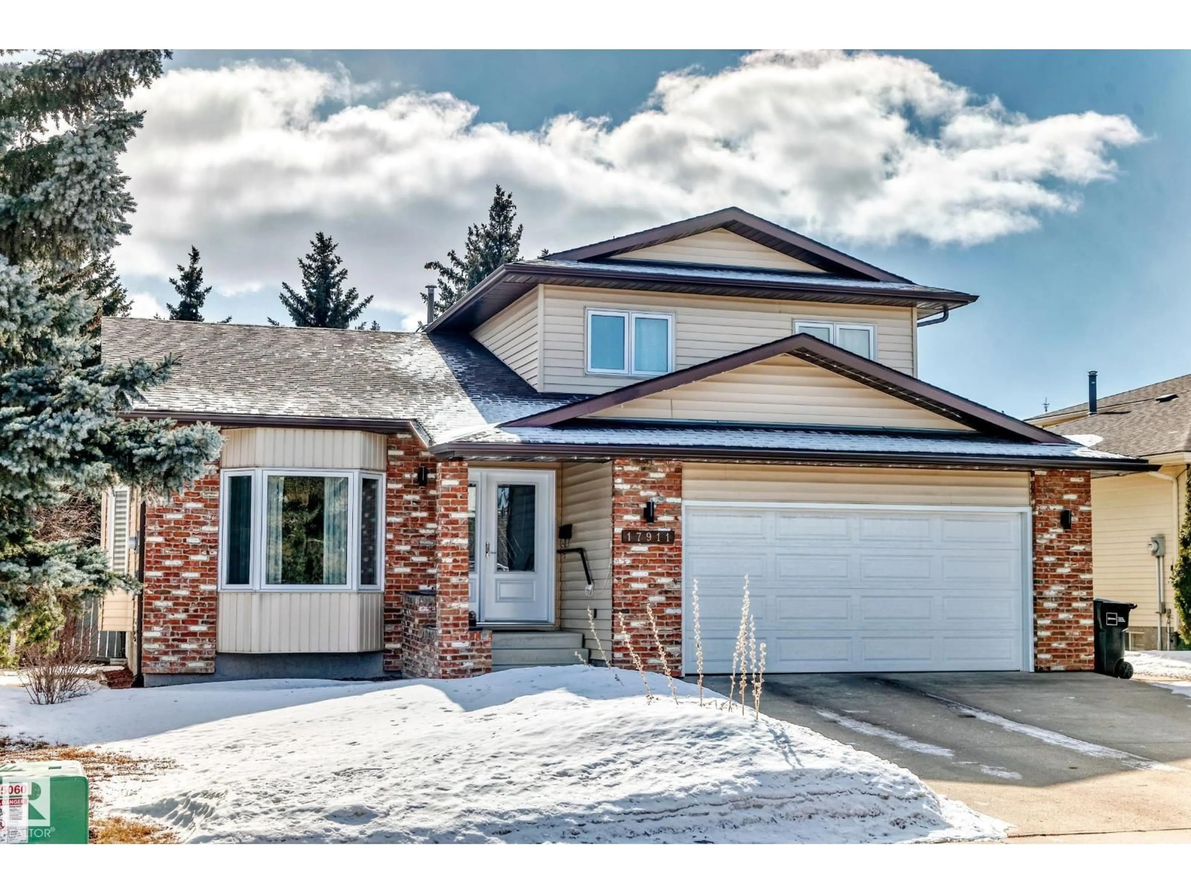 Home with brick exterior material, street for 17911 57 AV, Edmonton Alberta T6M1X5