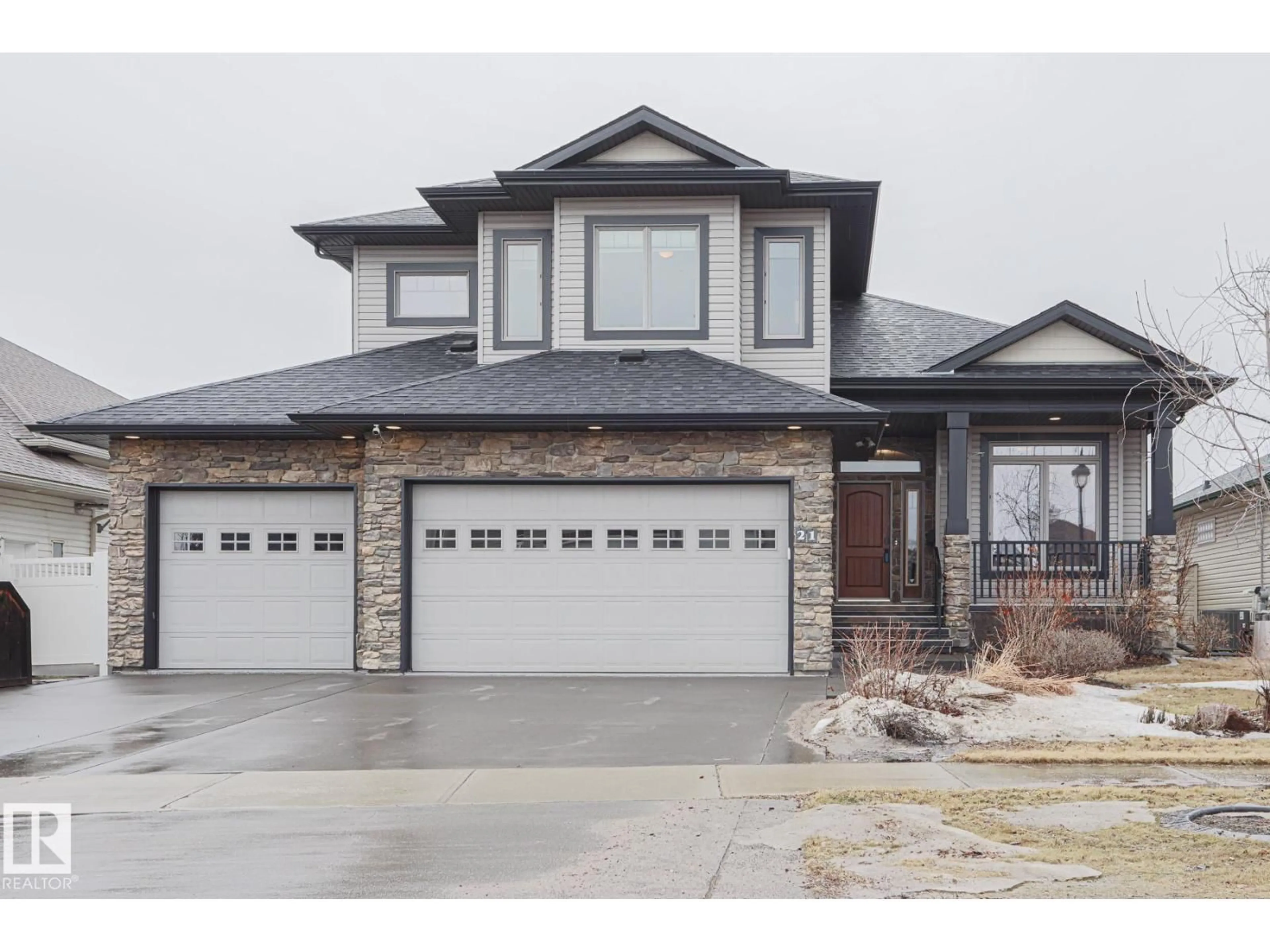 Home with brick exterior material, street for 21 WILLOW WY, Stony Plain Alberta T7Z2W2