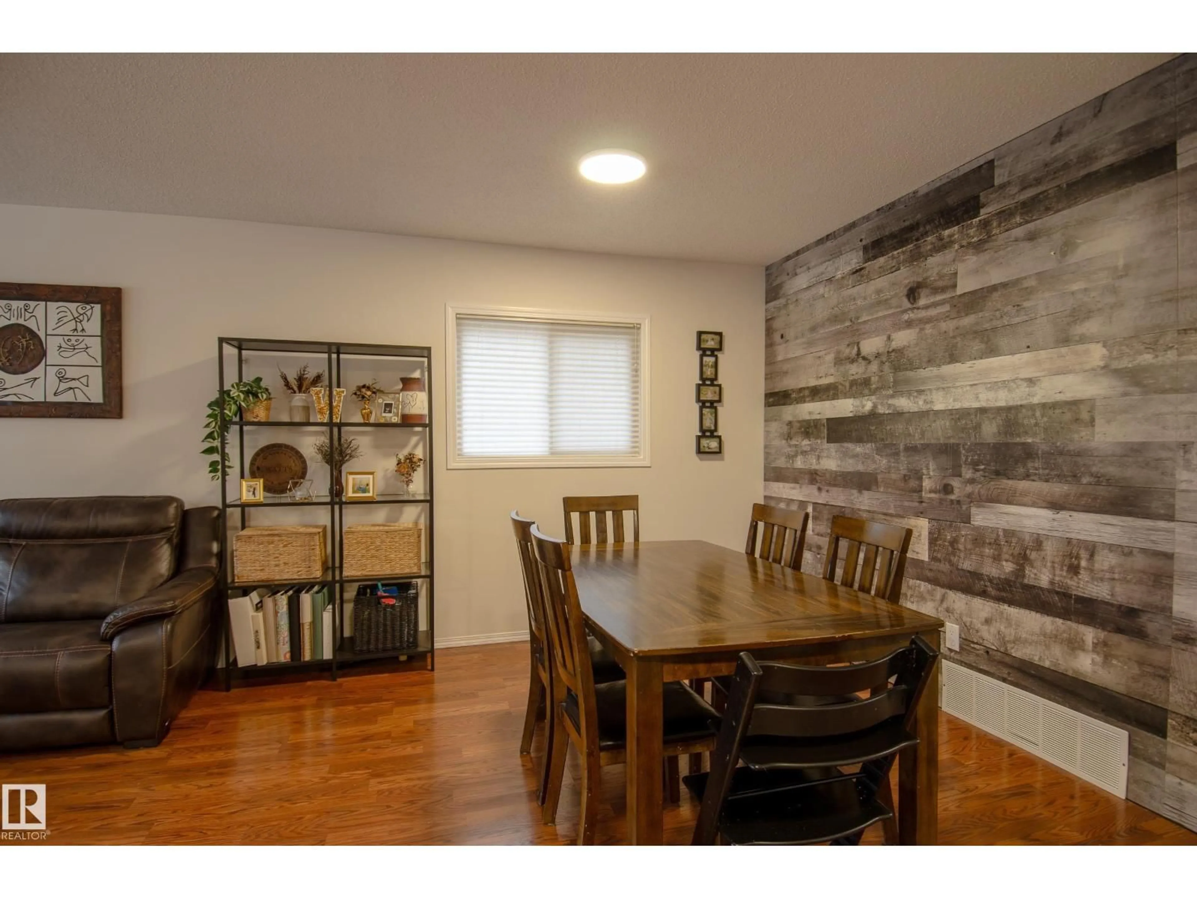 Dining room, wood/laminate floor for 3516 13 AV, Edmonton Alberta T6L3B3