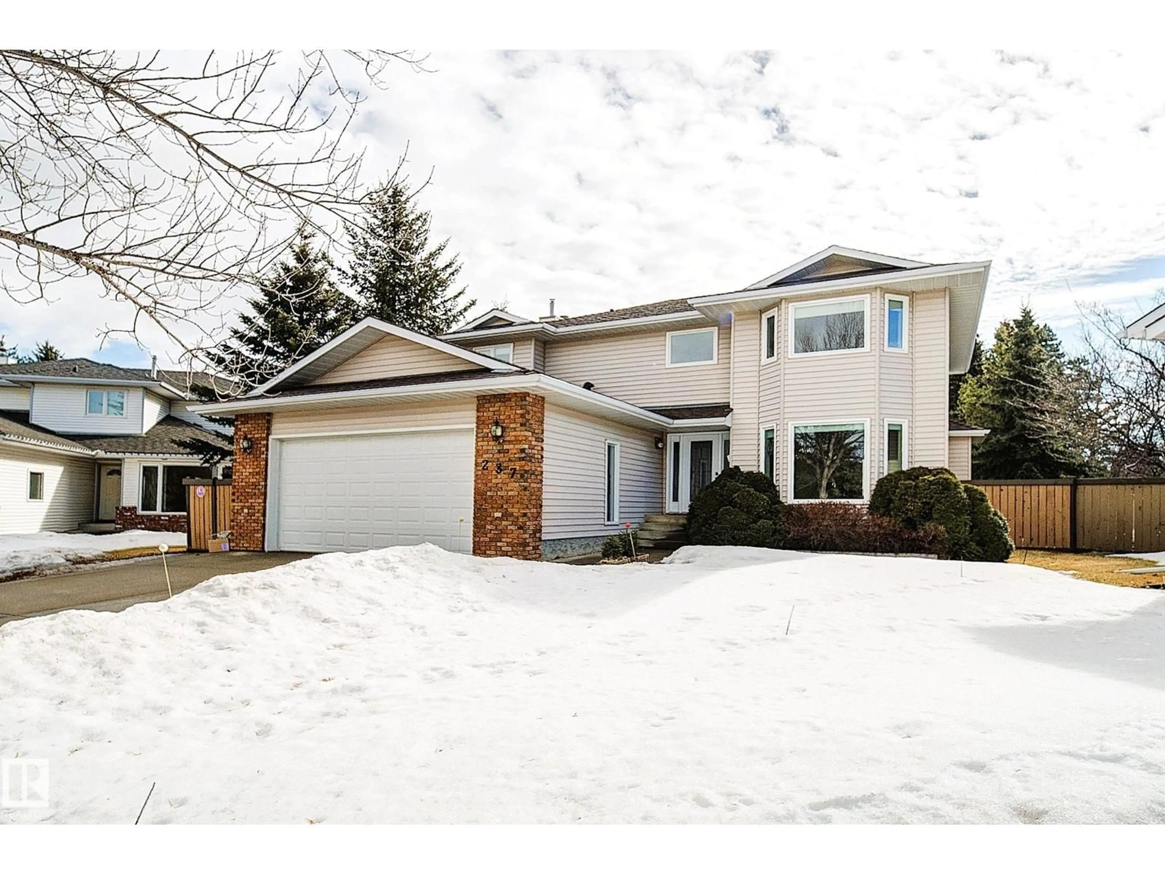 Home with vinyl exterior material, street for 237 BULYEA RD, Edmonton Alberta T6R1X7