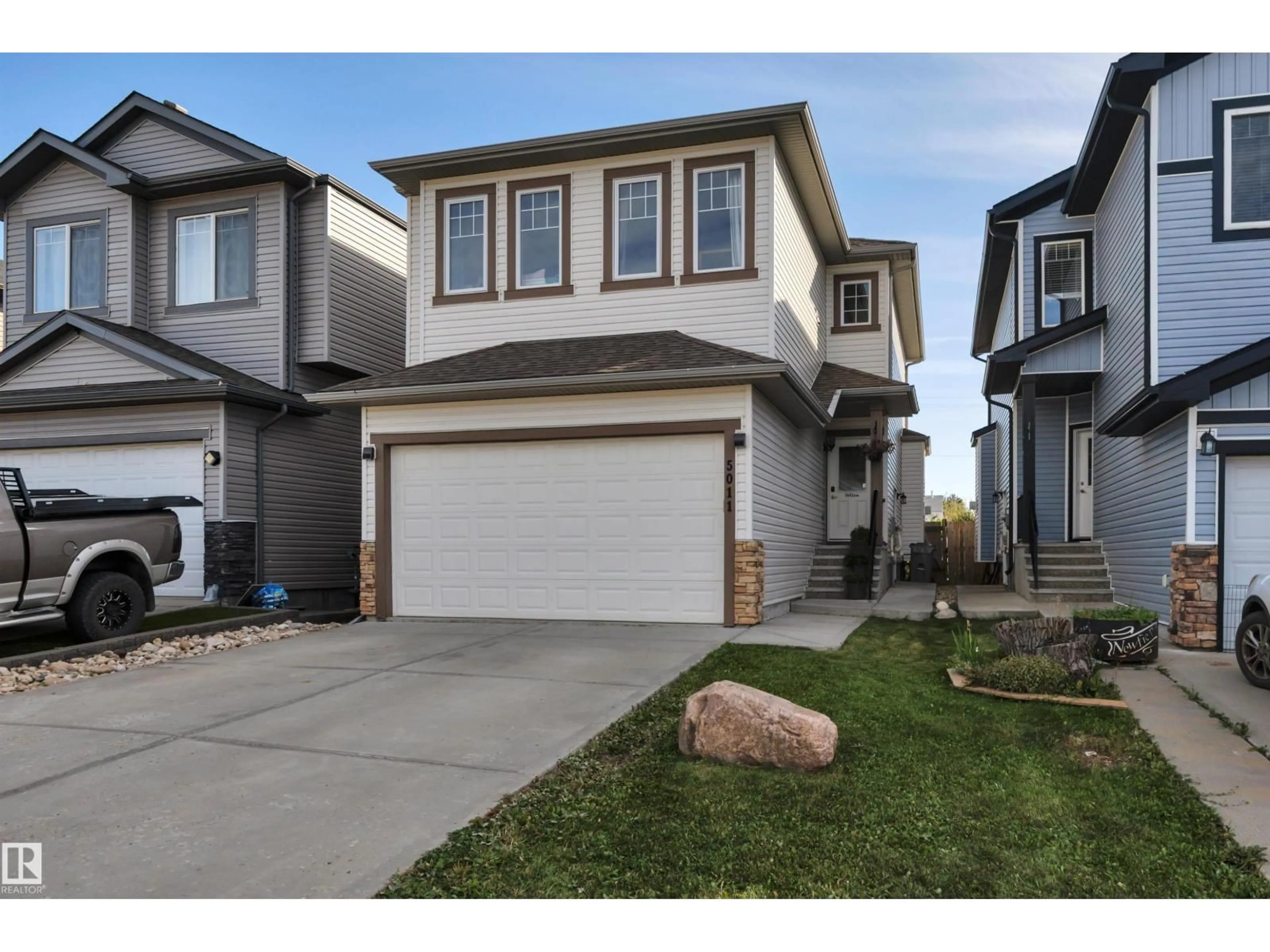 Home with vinyl exterior material, street for 5011 53 AV, Calmar Alberta T0C0V0