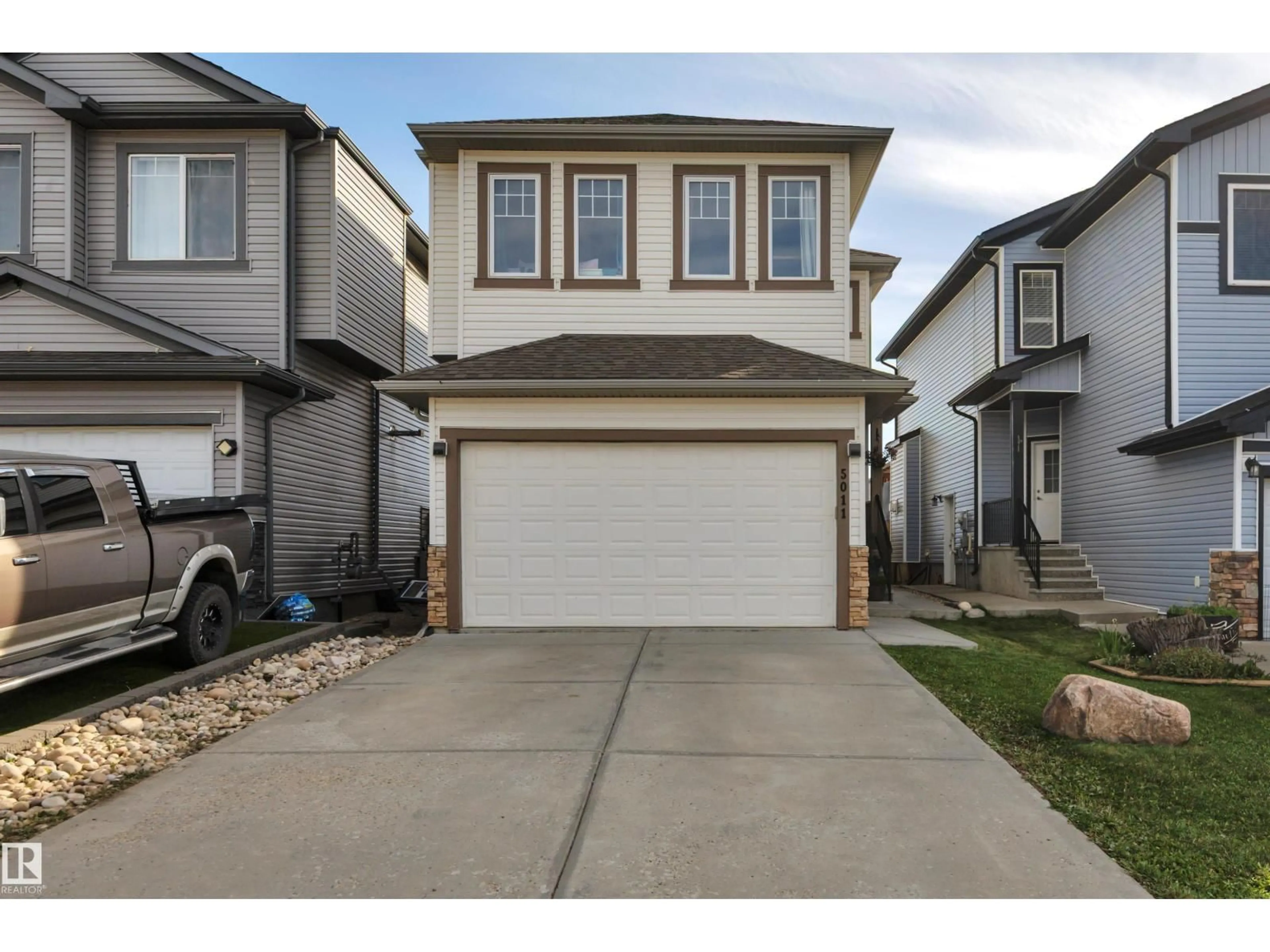 Home with vinyl exterior material, street for 5011 53 AV, Calmar Alberta T0C0V0