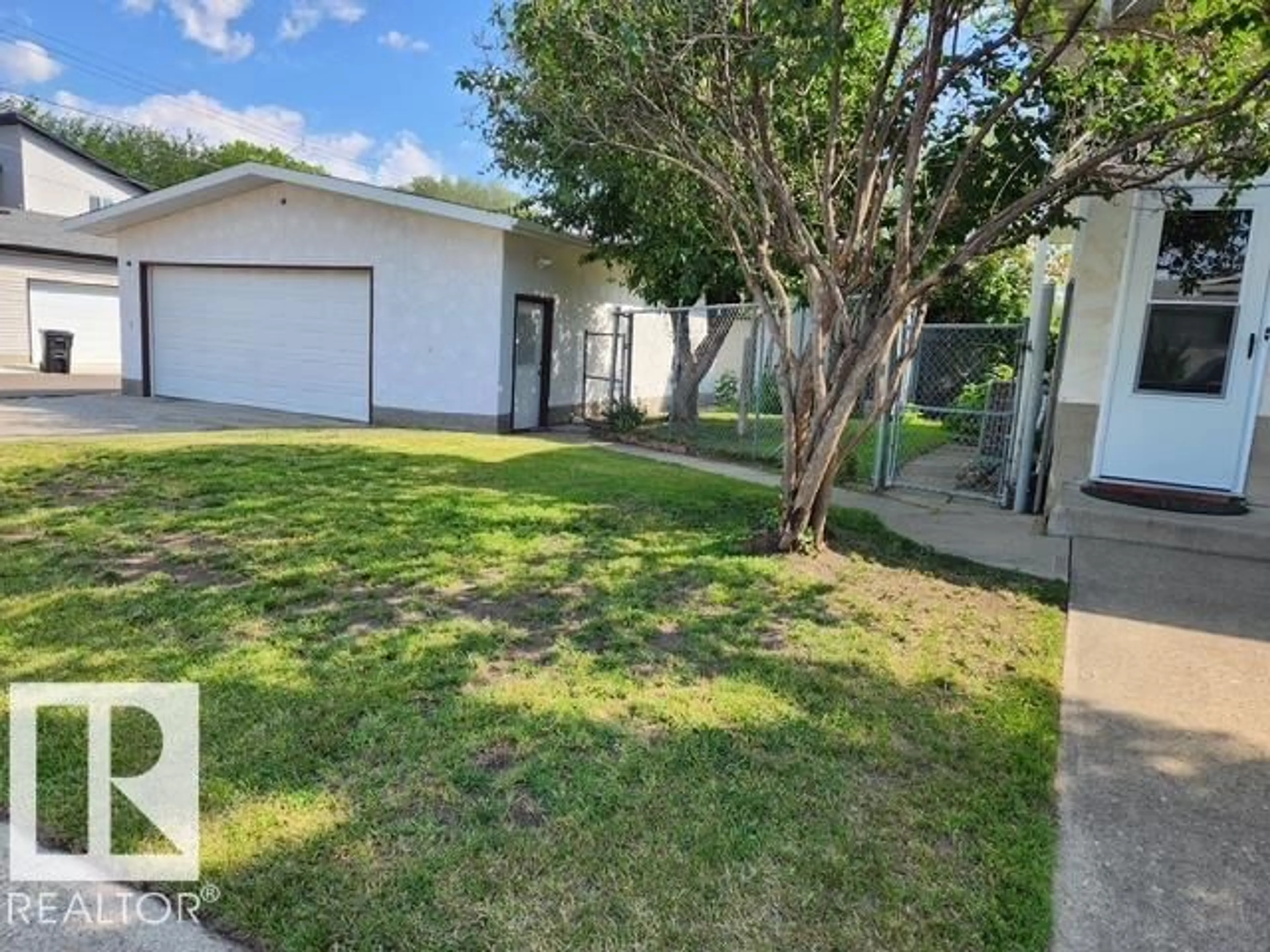 A pic from outside/outdoor area/front of a property/back of a property/a pic from drone, street for 4248 114 AV, Edmonton Alberta T5W0T2