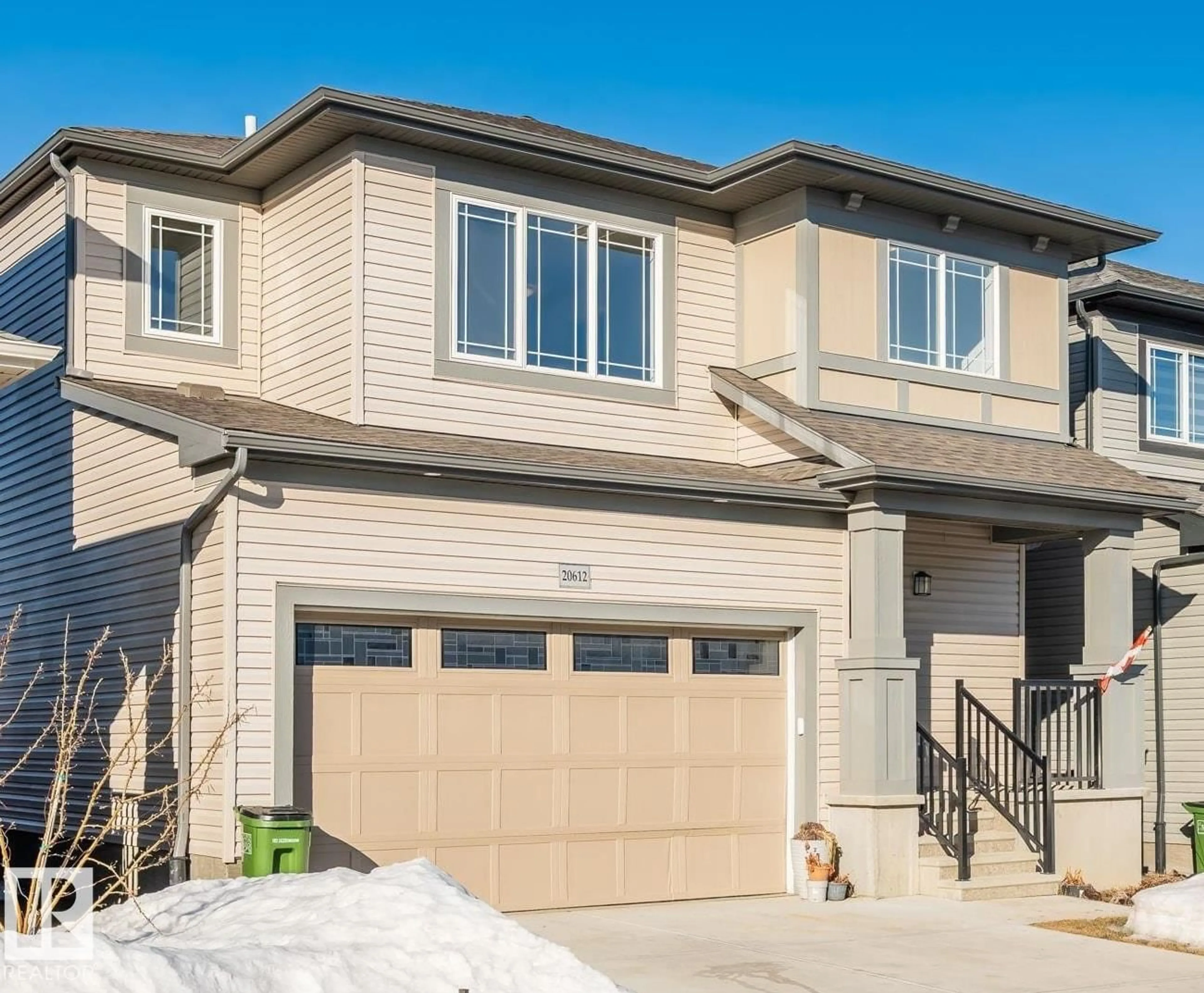 Home with vinyl exterior material, street for NW - 20612 22 AV, Edmonton Alberta T6M1N3