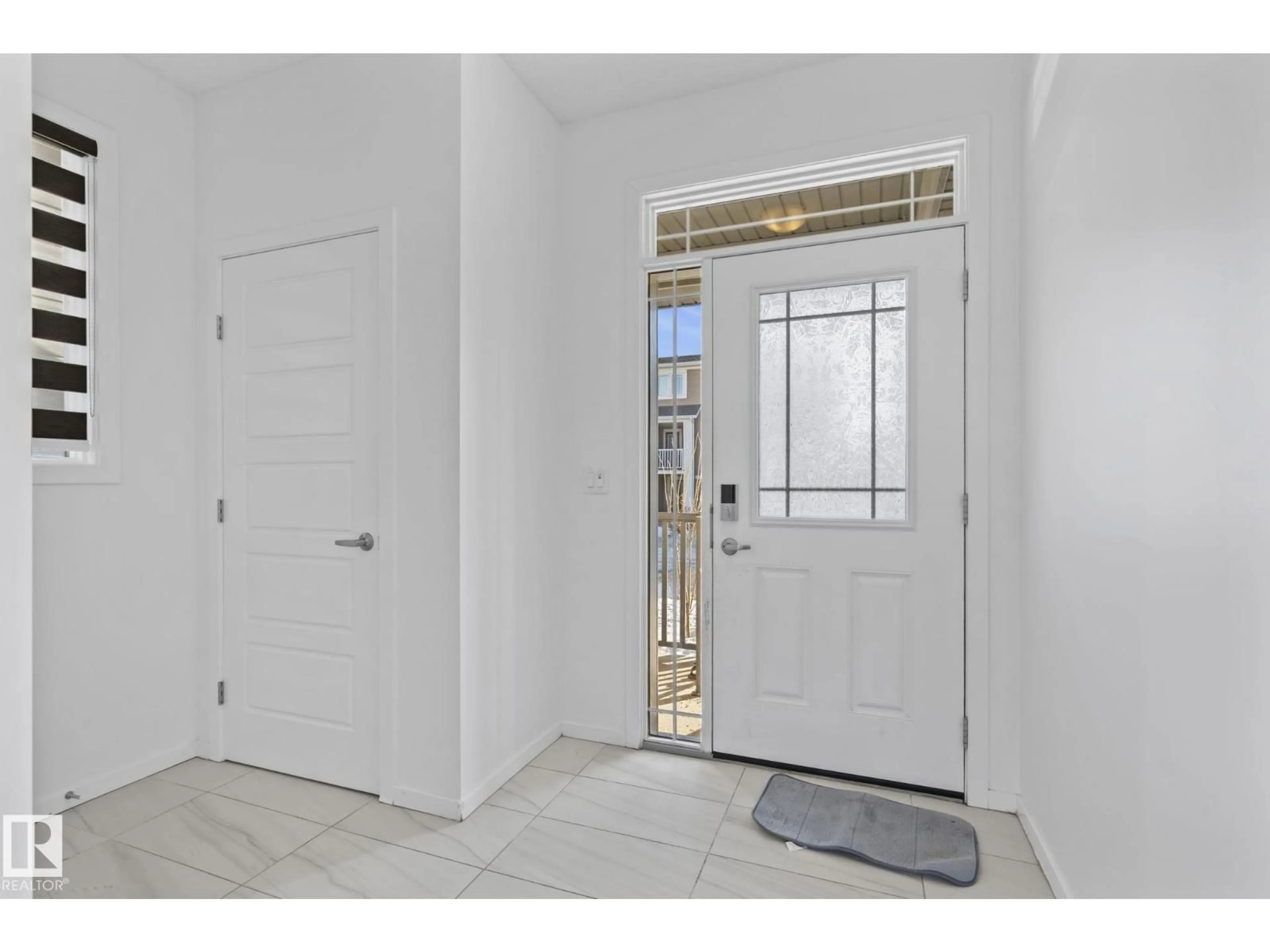 Indoor entryway for NW - 20612 22 AV, Edmonton Alberta T6M1N3