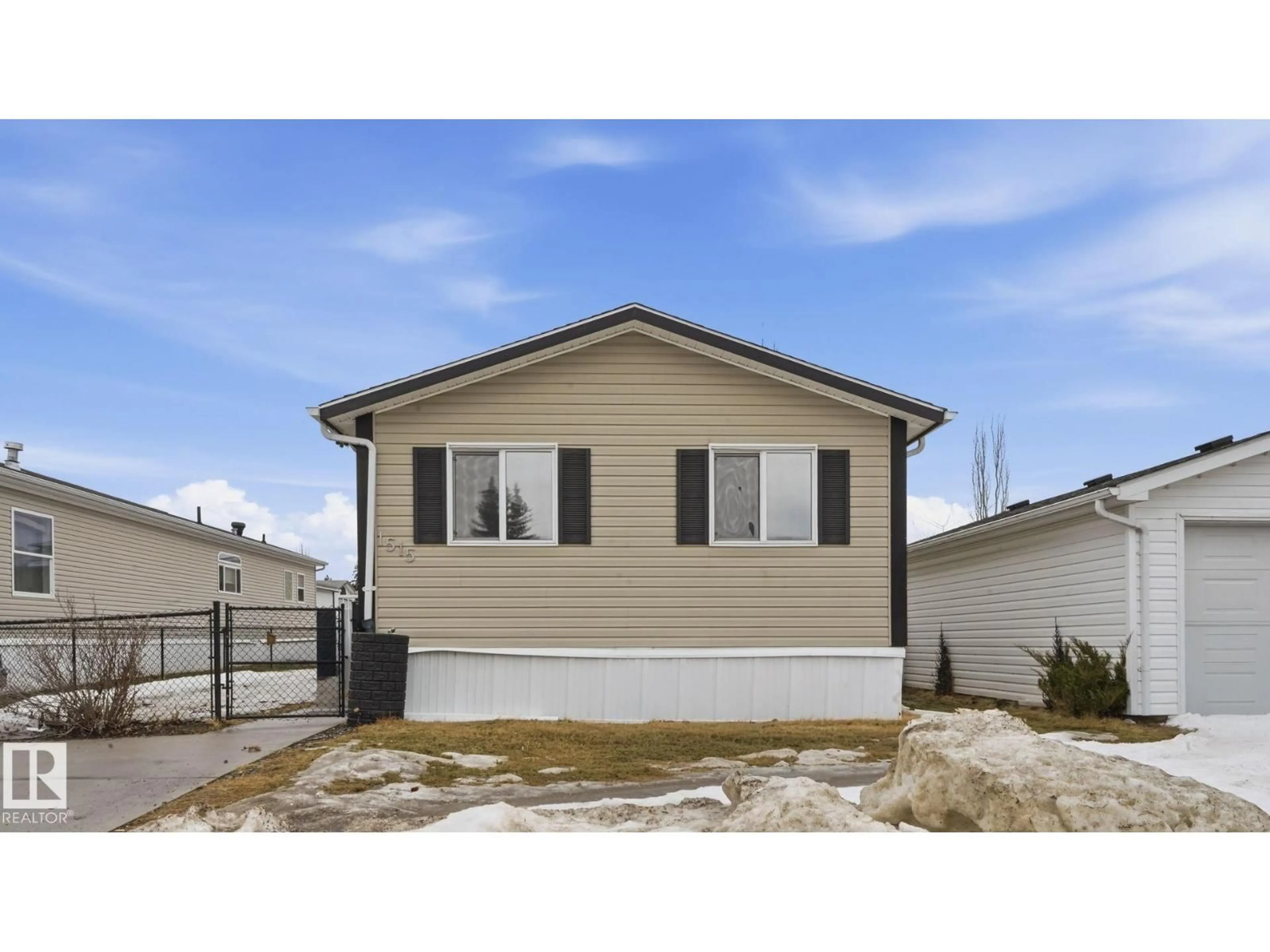 Home with vinyl exterior material, street for 1515 RR272, Rural Parkland County Alberta T7X3X6