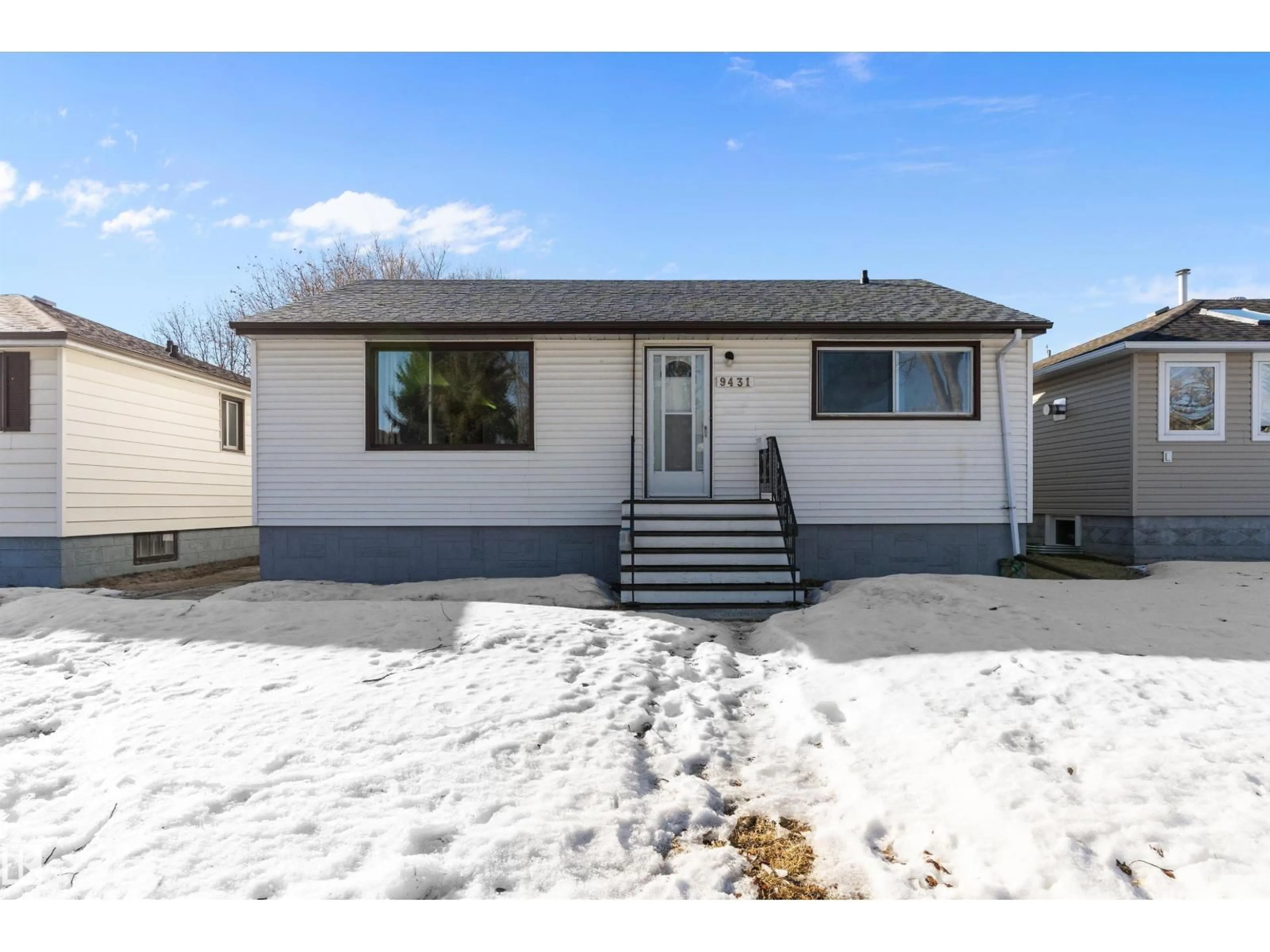 Home with vinyl exterior material, street for 9431 65 AV, Edmonton Alberta T6E0K1