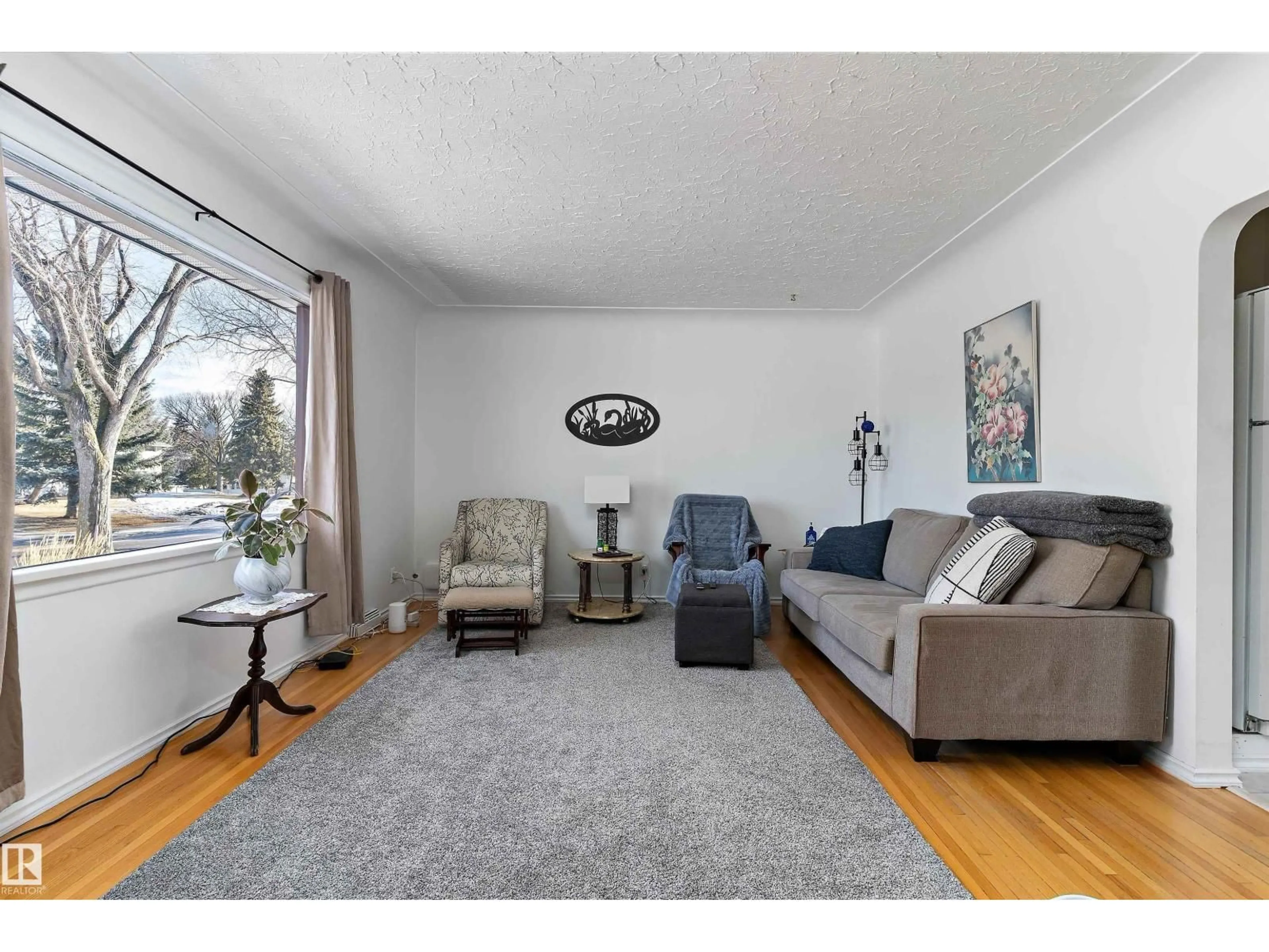 Living room with furniture, unknown for 9431 65 AV, Edmonton Alberta T6E0K1