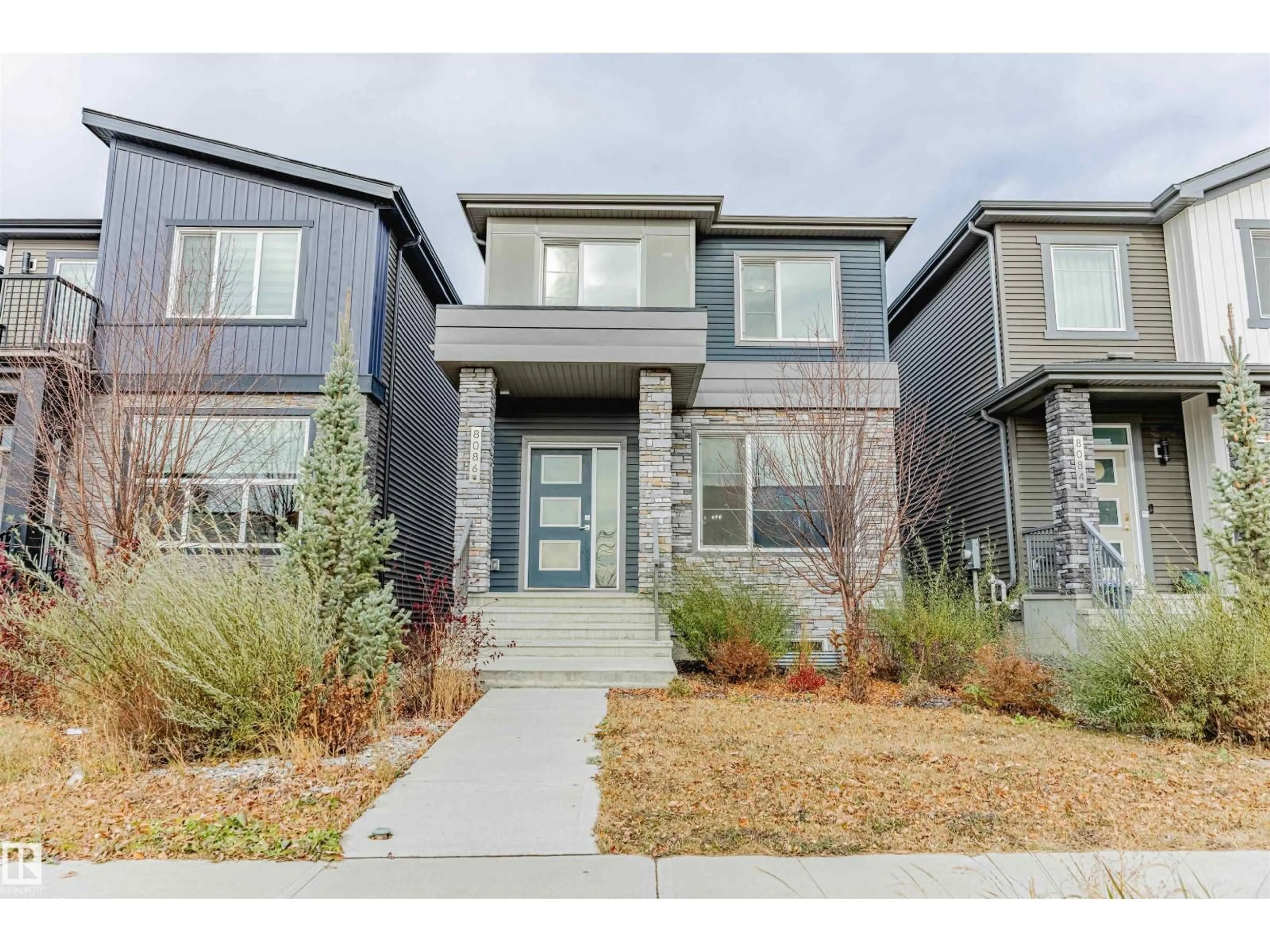 Home with brick exterior material, street for SW - 8086 KIRIAK LINK, Edmonton Alberta T6W4V2