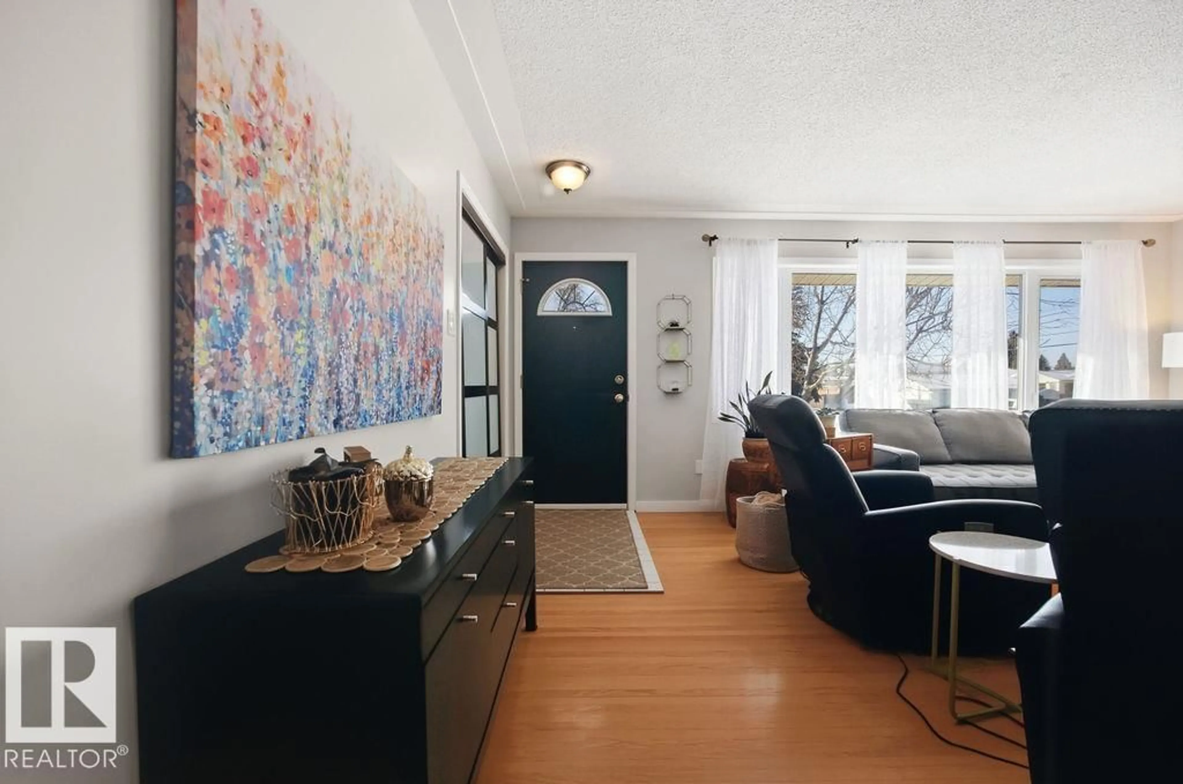 Living room with furniture, unknown for 8508 131 AV, Edmonton Alberta T5E0W2