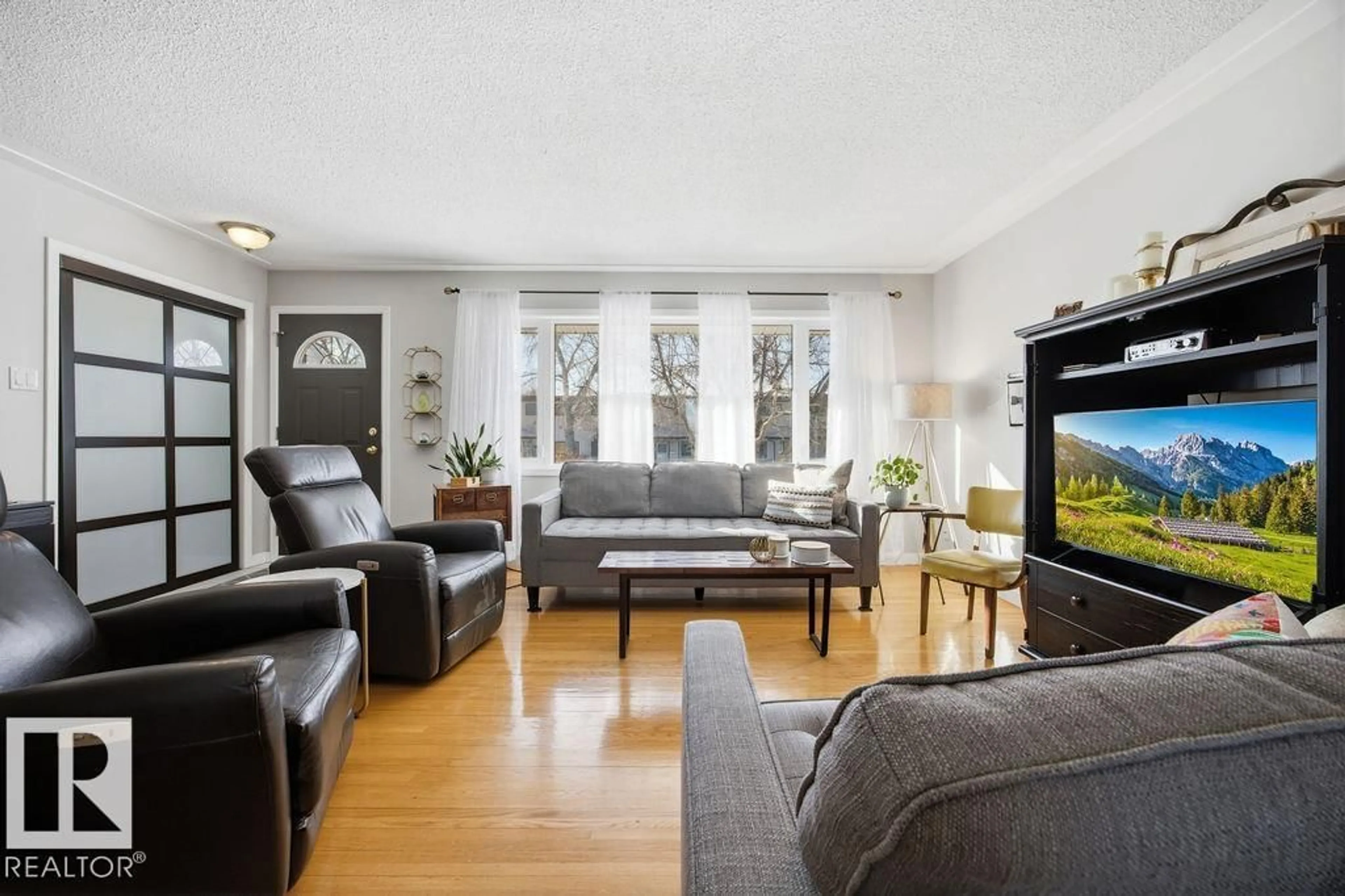 Living room with furniture, unknown for 8508 131 AV, Edmonton Alberta T5E0W2