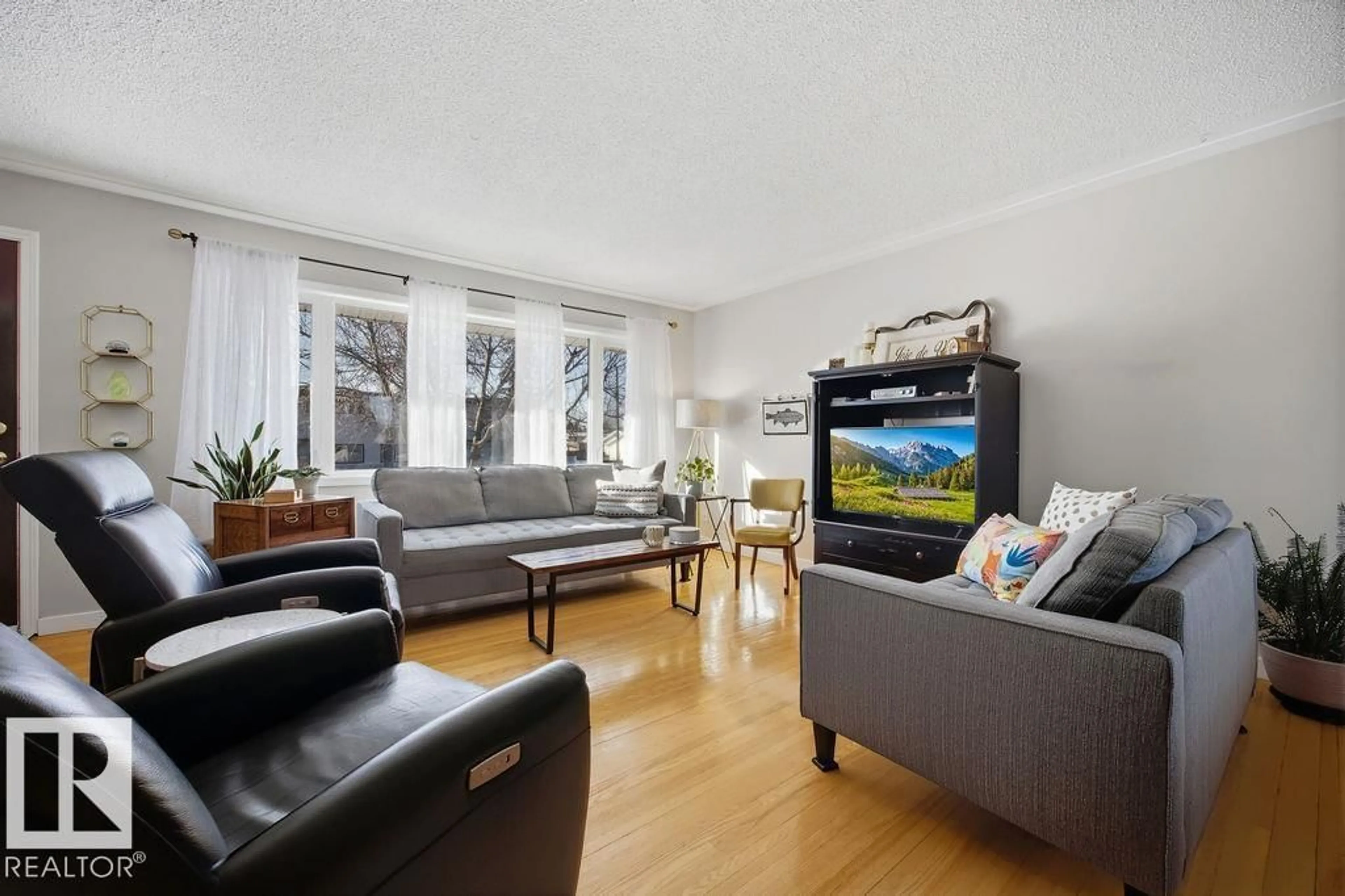 Living room with furniture, unknown for 8508 131 AV, Edmonton Alberta T5E0W2