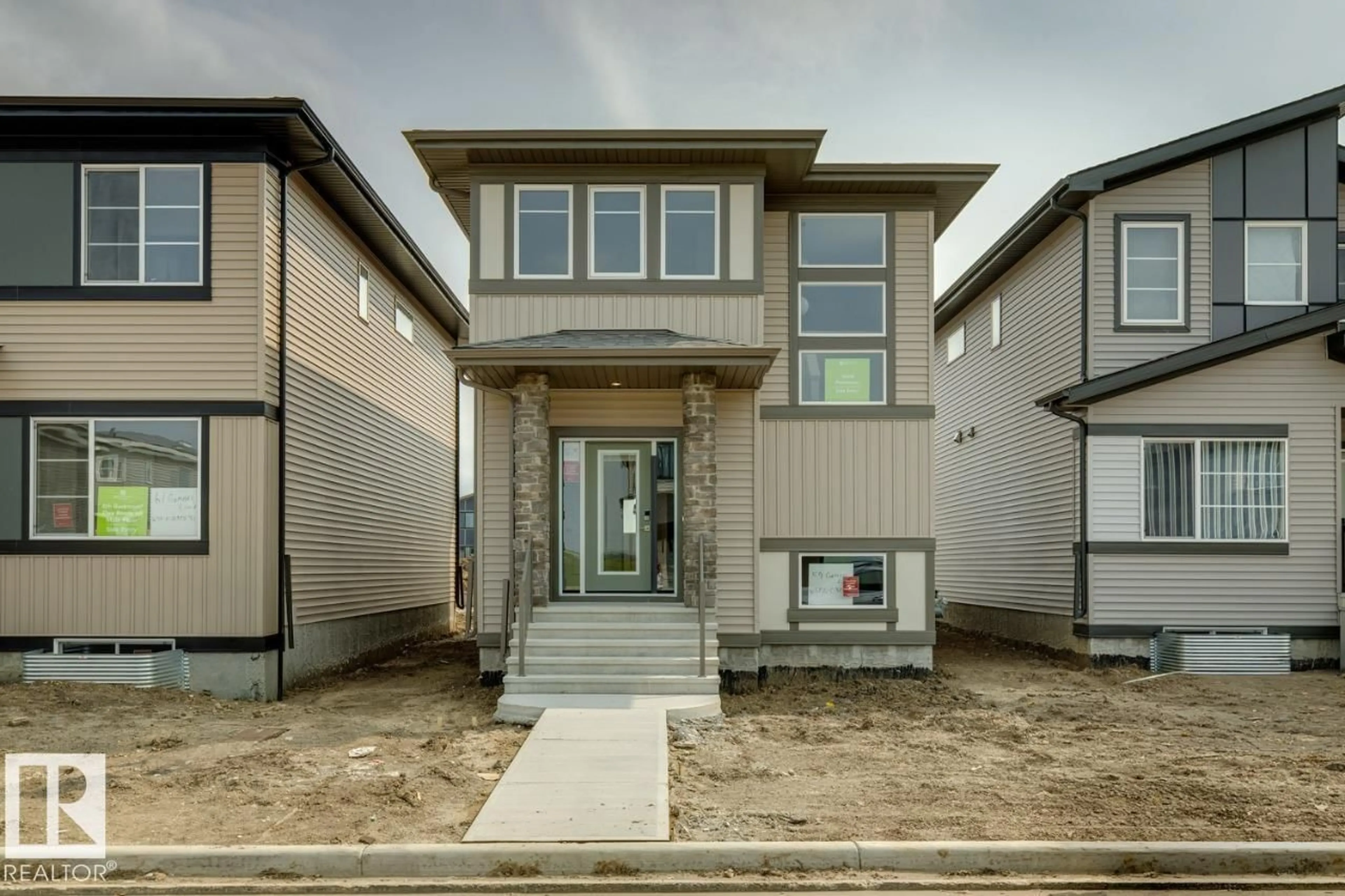 Home with vinyl exterior material, street for 59 GAMBEL LO, Spruce Grove Alberta T7X0C9