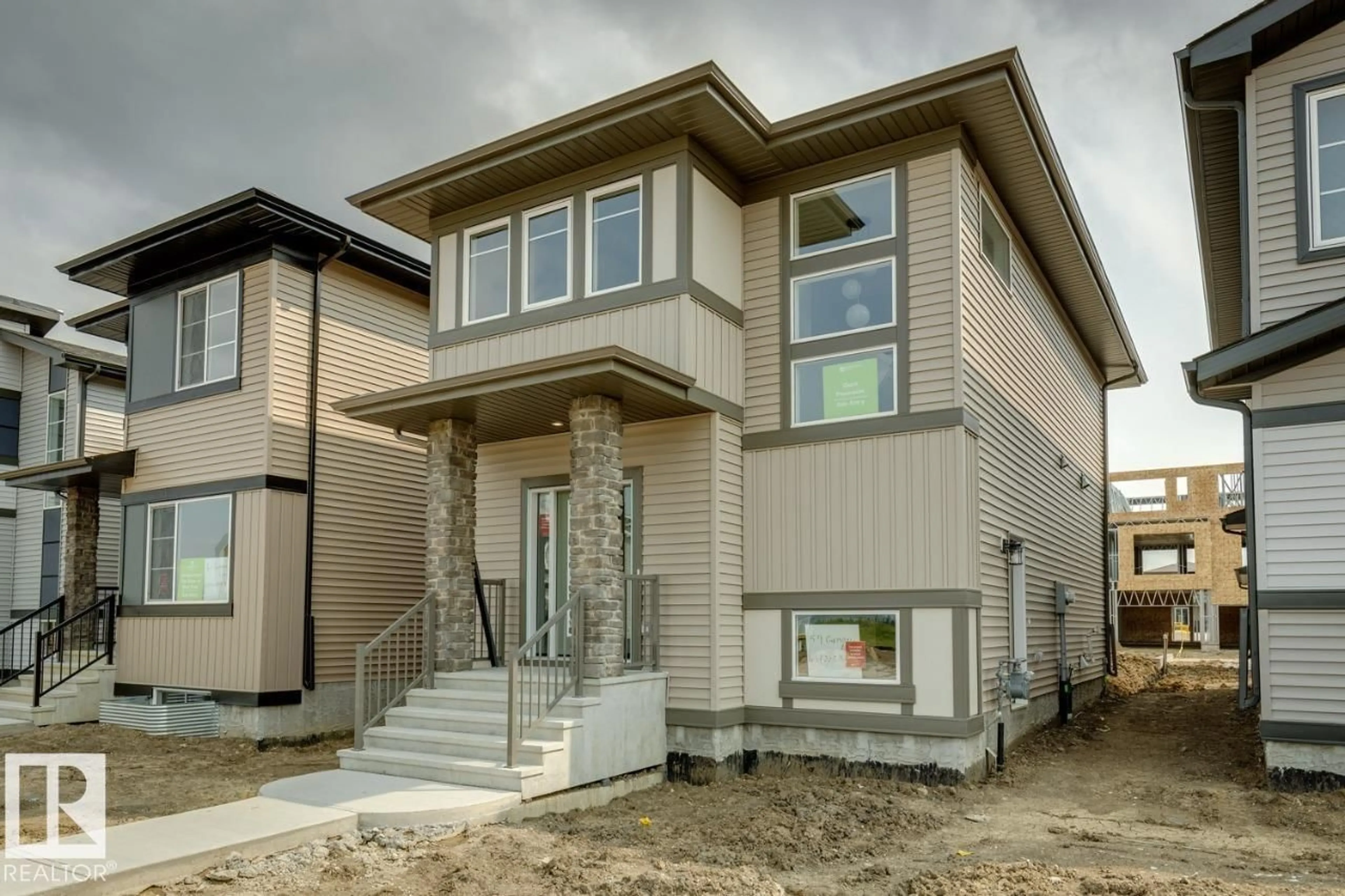 Home with vinyl exterior material, street for 59 GAMBEL LO, Spruce Grove Alberta T7X0C9