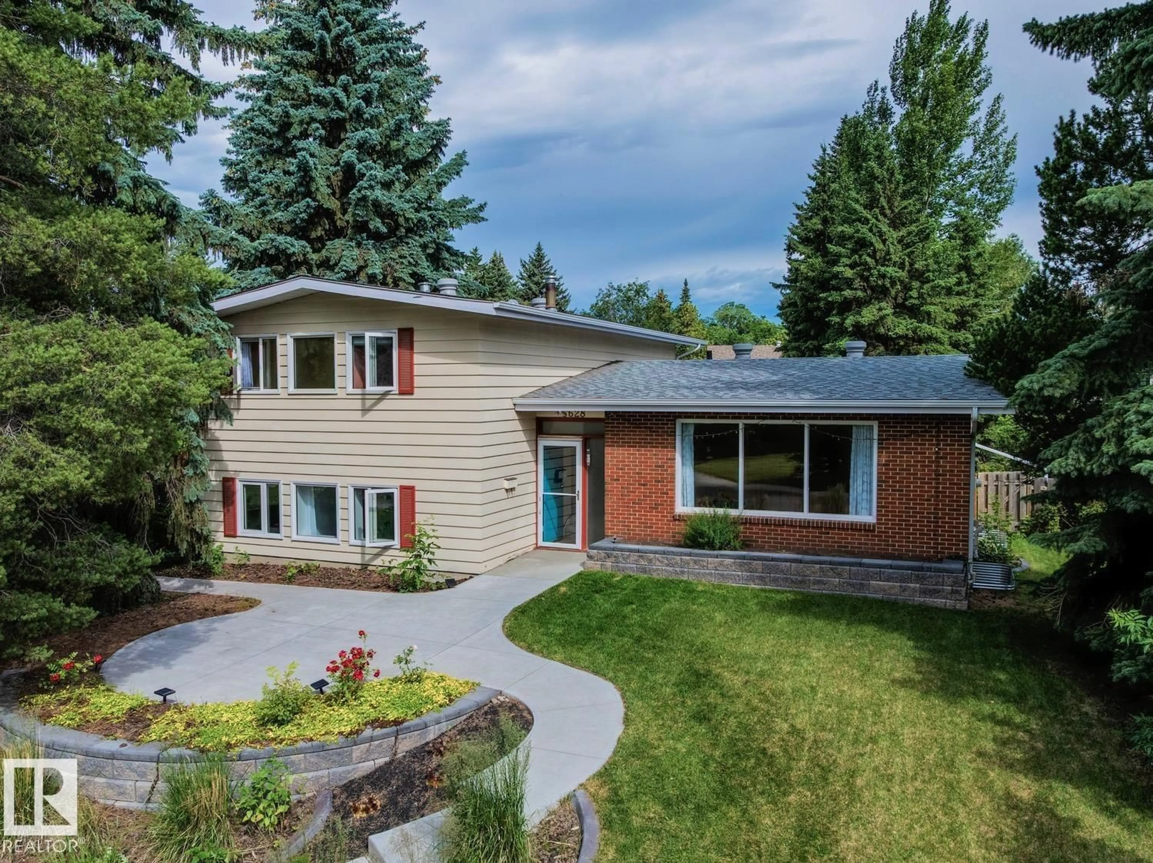 Home with brick exterior material, street for NW - 6628 124 ST, Edmonton Alberta T6H3V3