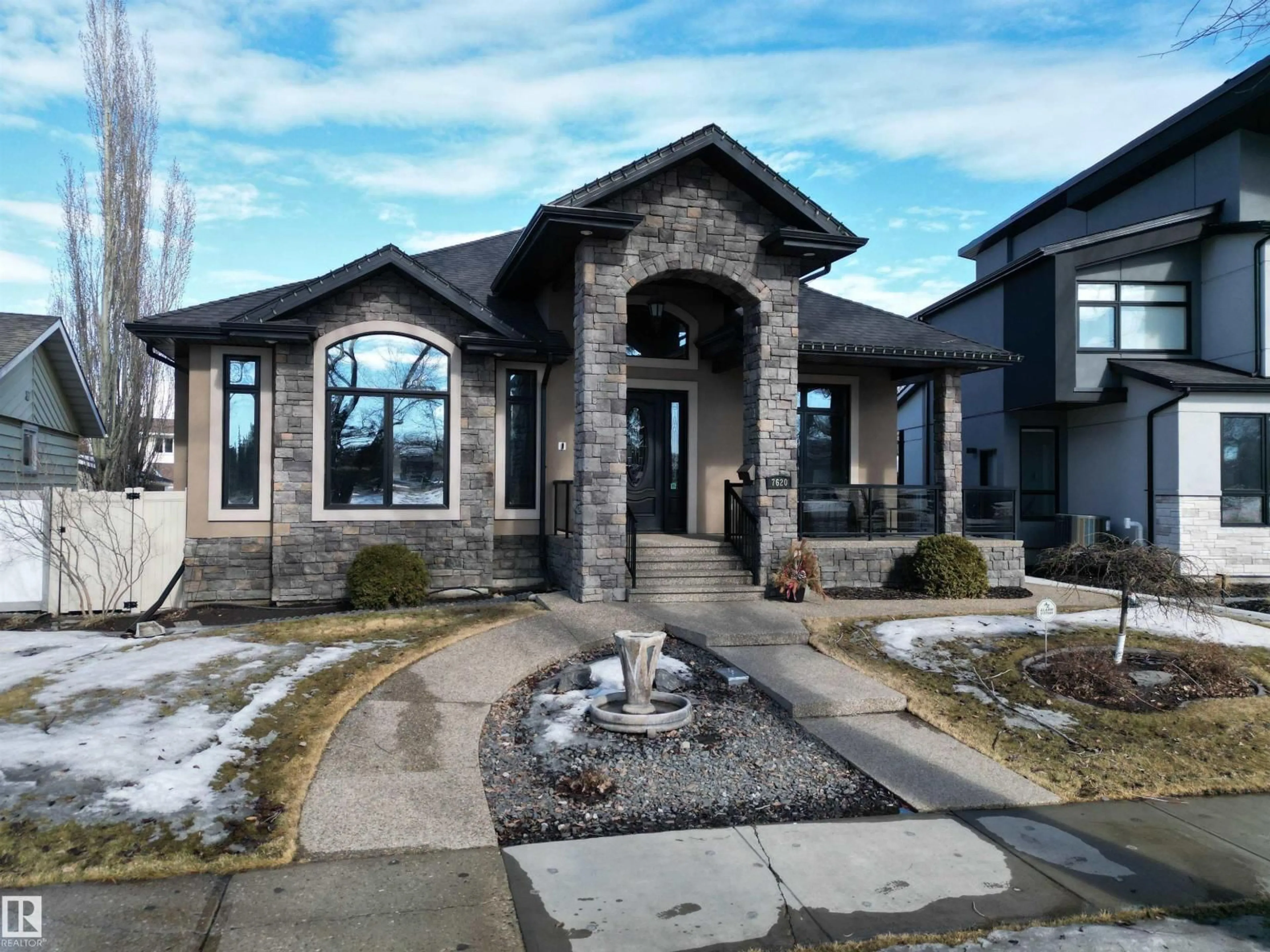 Home with brick exterior material, street for 7620 98A AV, Edmonton Alberta T6A0C5