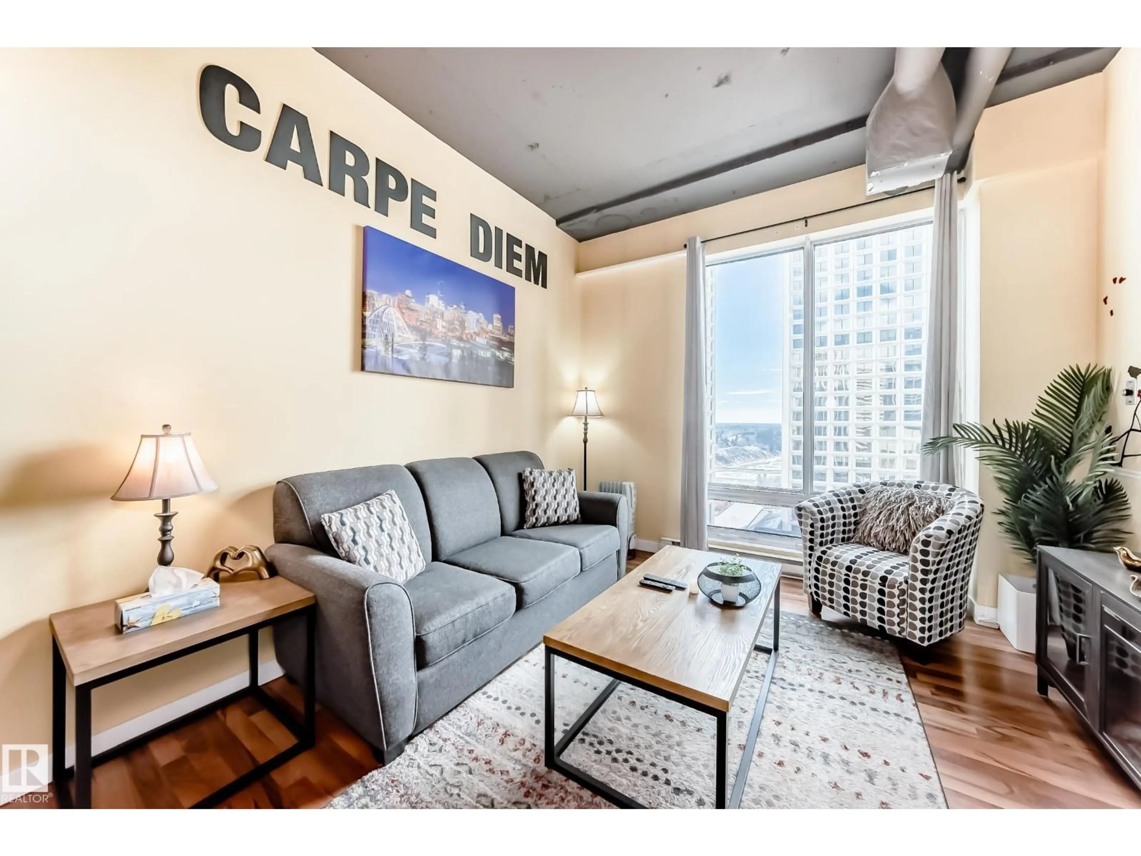 Living room with furniture, carpet floor for #1010 - 1010 JASPER AV, Edmonton Alberta T5J1R9