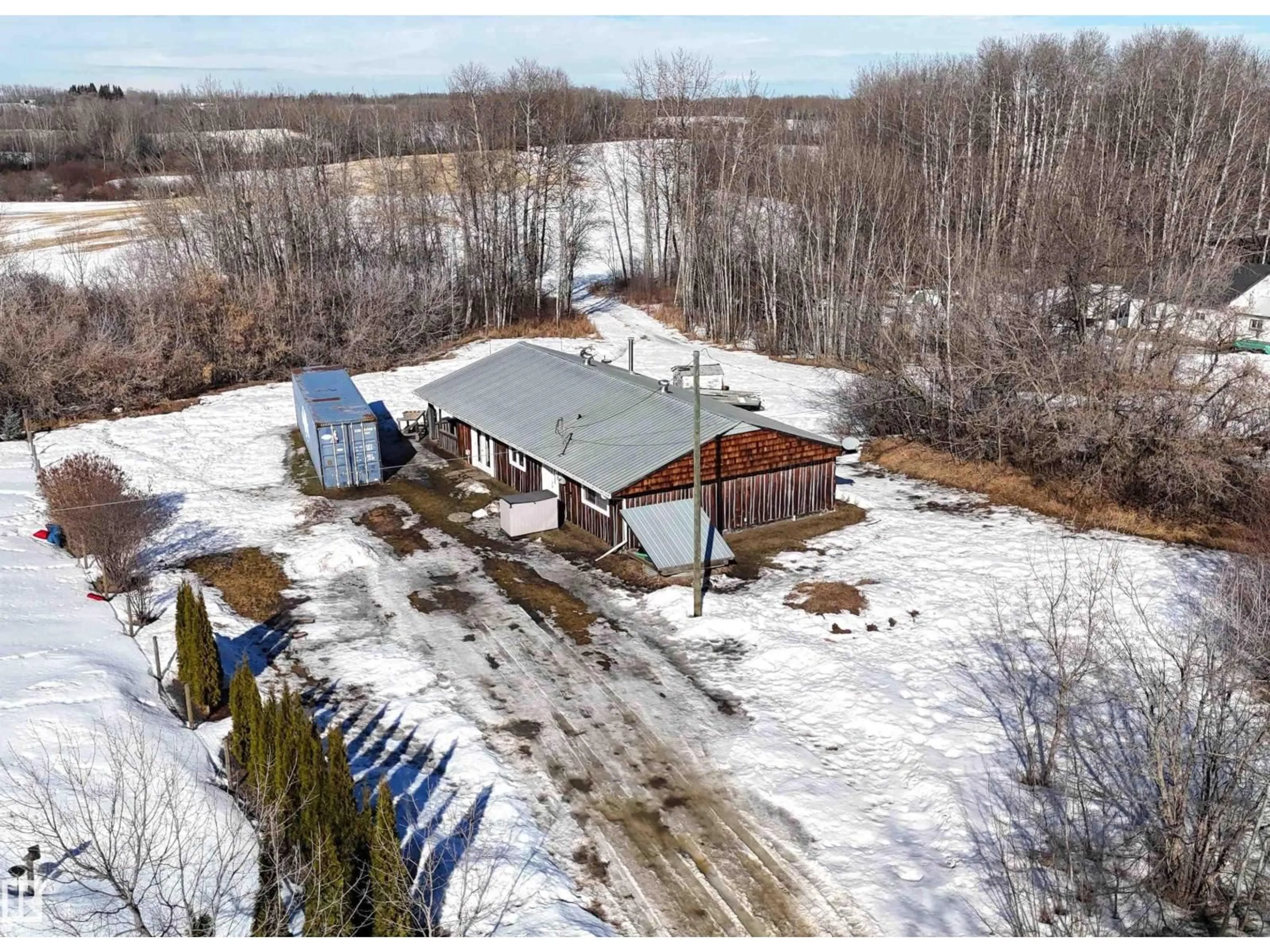 A pic from outside/outdoor area/front of a property/back of a property/a pic from drone, unknown for #6 - 52511 HGHWAY, Rural Parkland County Alberta T7Y3P2