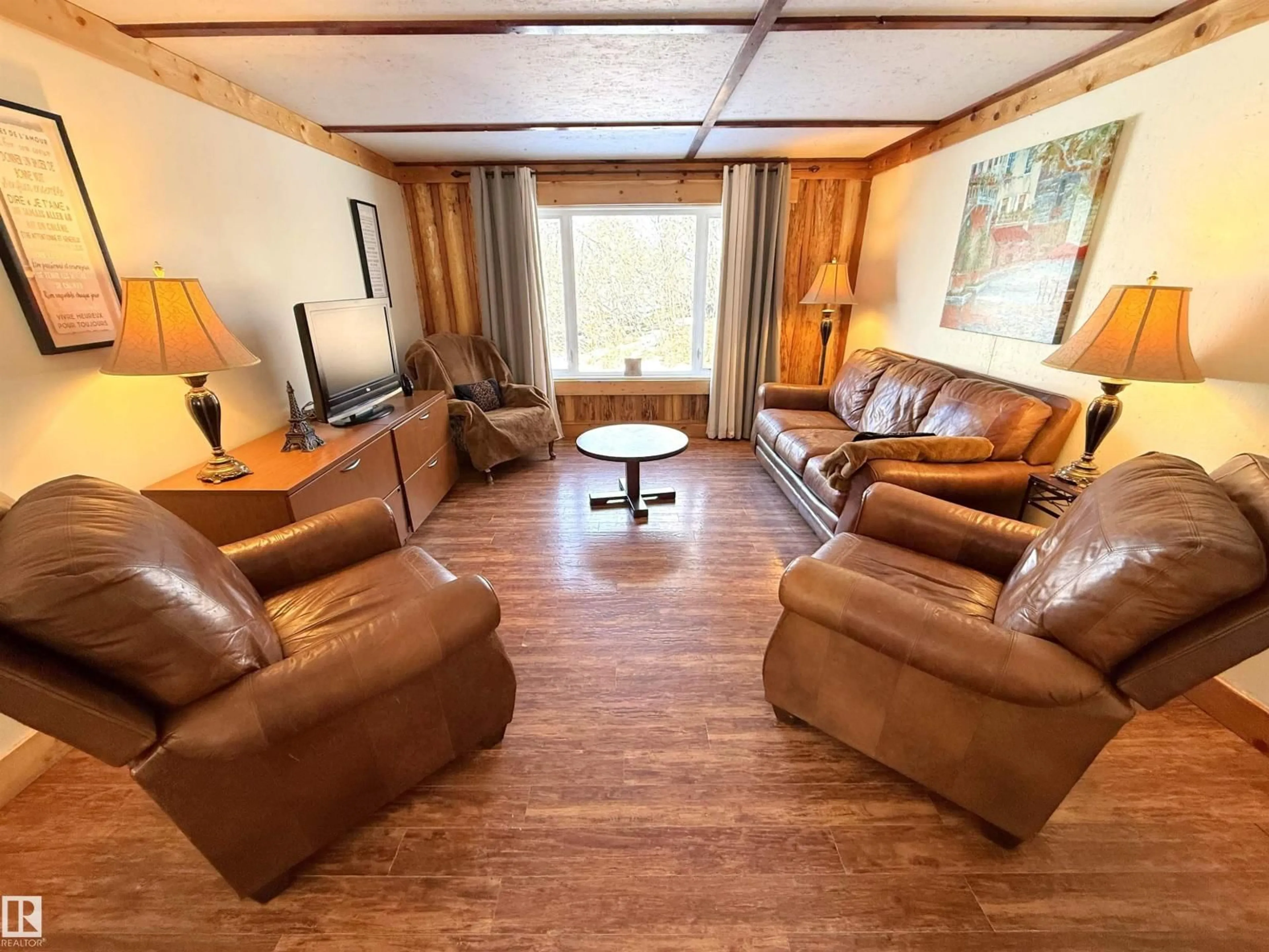 Living room with furniture, wood/laminate floor for #6 - 52511 HGHWAY, Rural Parkland County Alberta T7Y3P2