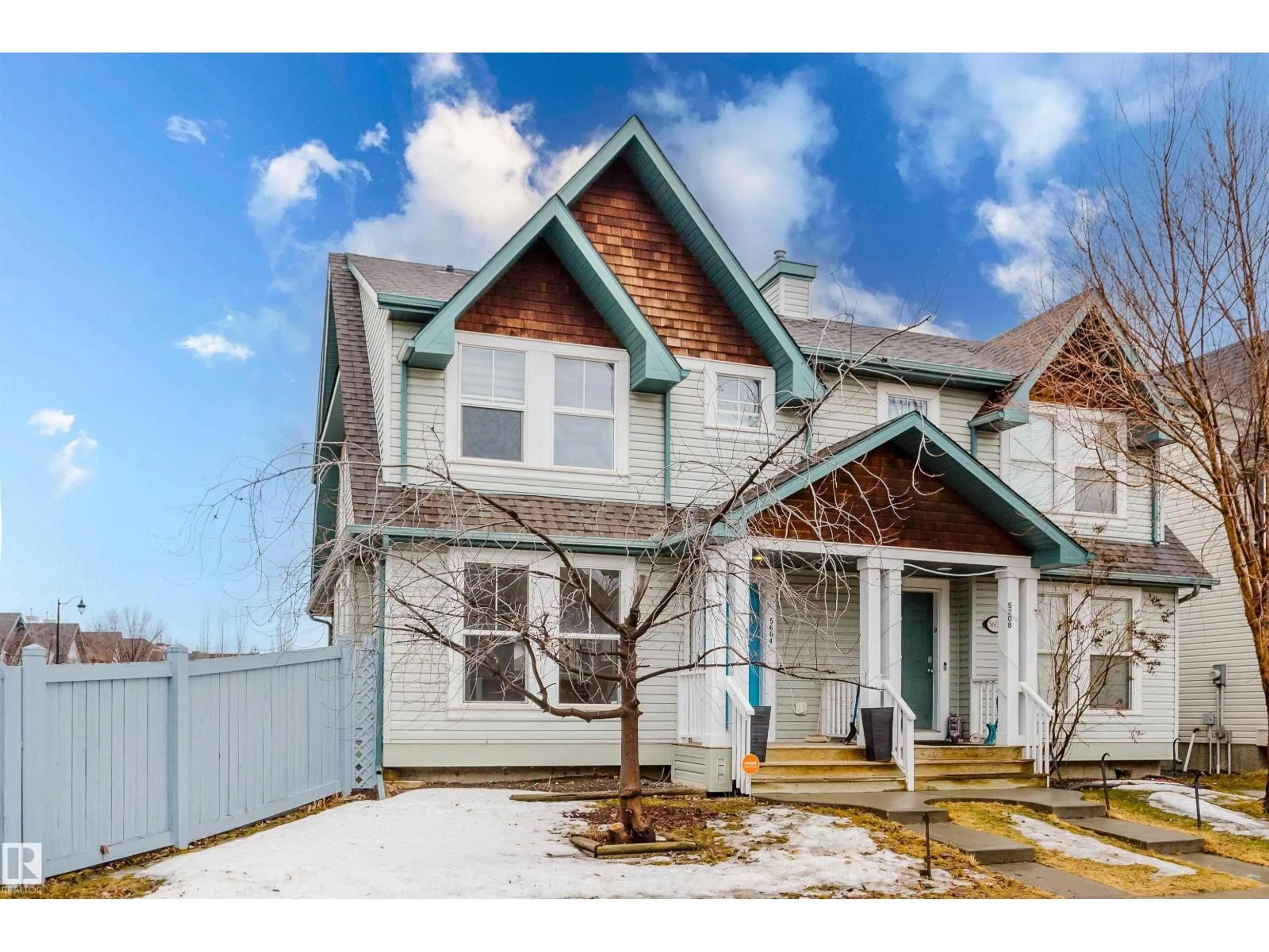 Home with vinyl exterior material, street for NW - 5604 202 ST, Edmonton Alberta T6M0B3