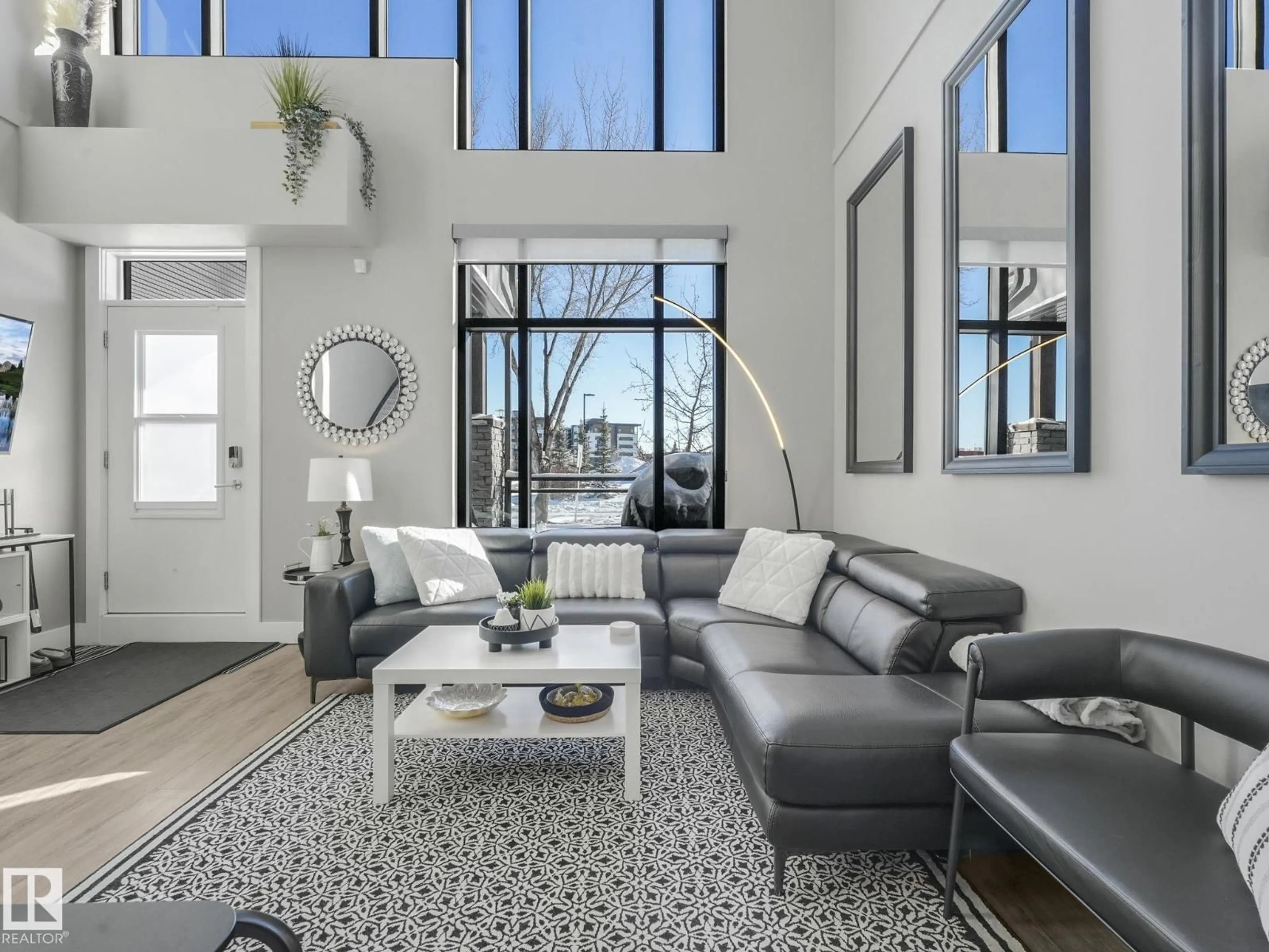 Living room with furniture, unknown for 524 - 127 GRIESBACH PR, Edmonton Alberta T5E6X2