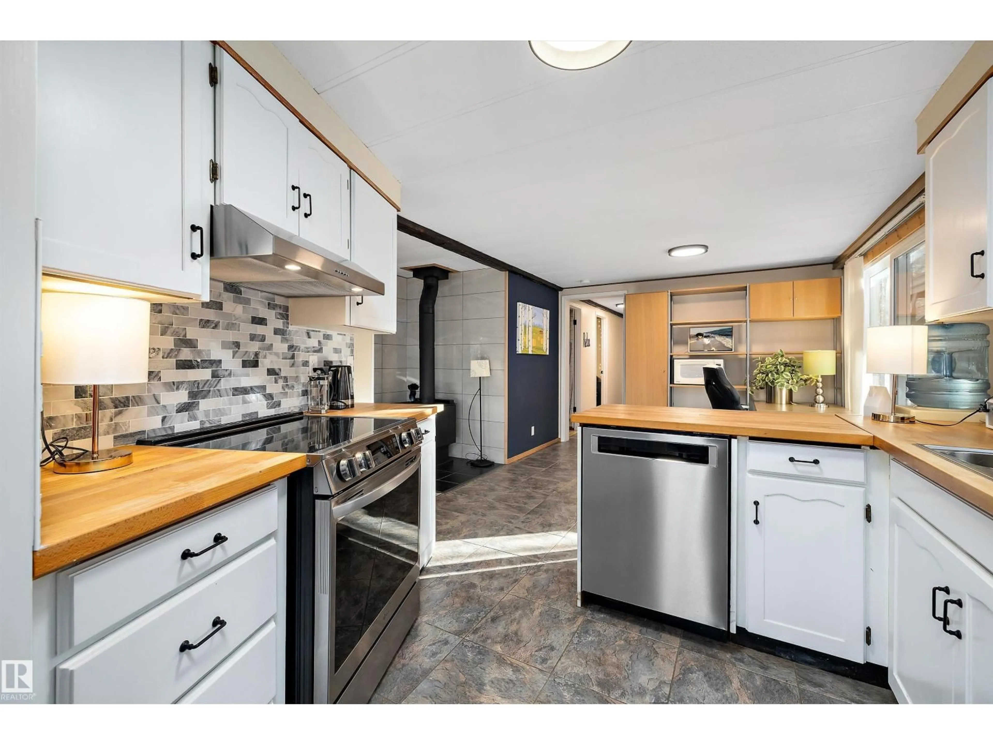 Open concept kitchen, ceramic/tile floor for 619 6TH ST, Rural Wetaskiwin County Alberta T0C2V0