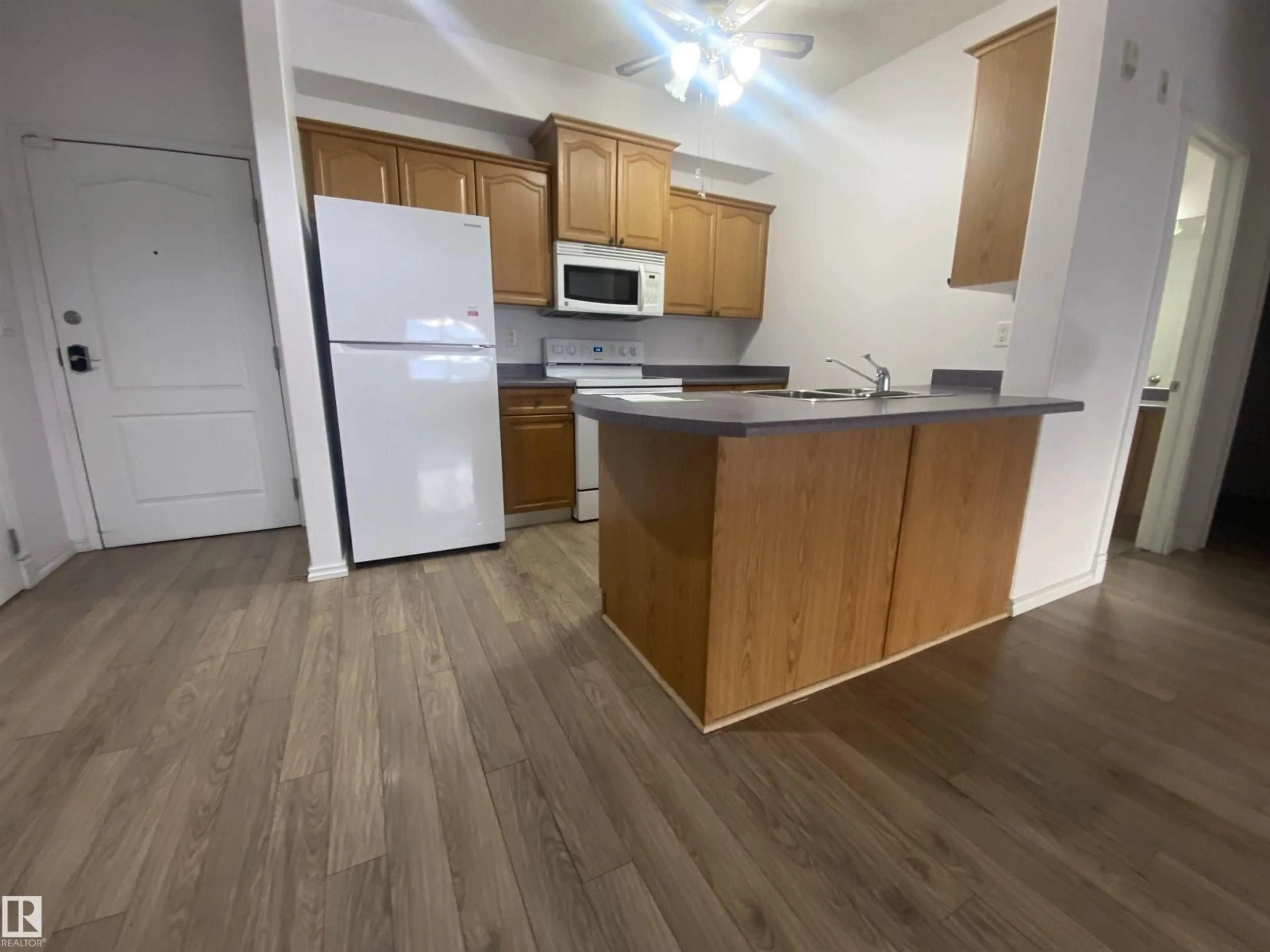 Standard kitchen, wood/laminate floor for 206 - 16715 100 AV, Edmonton Alberta T5J1V7