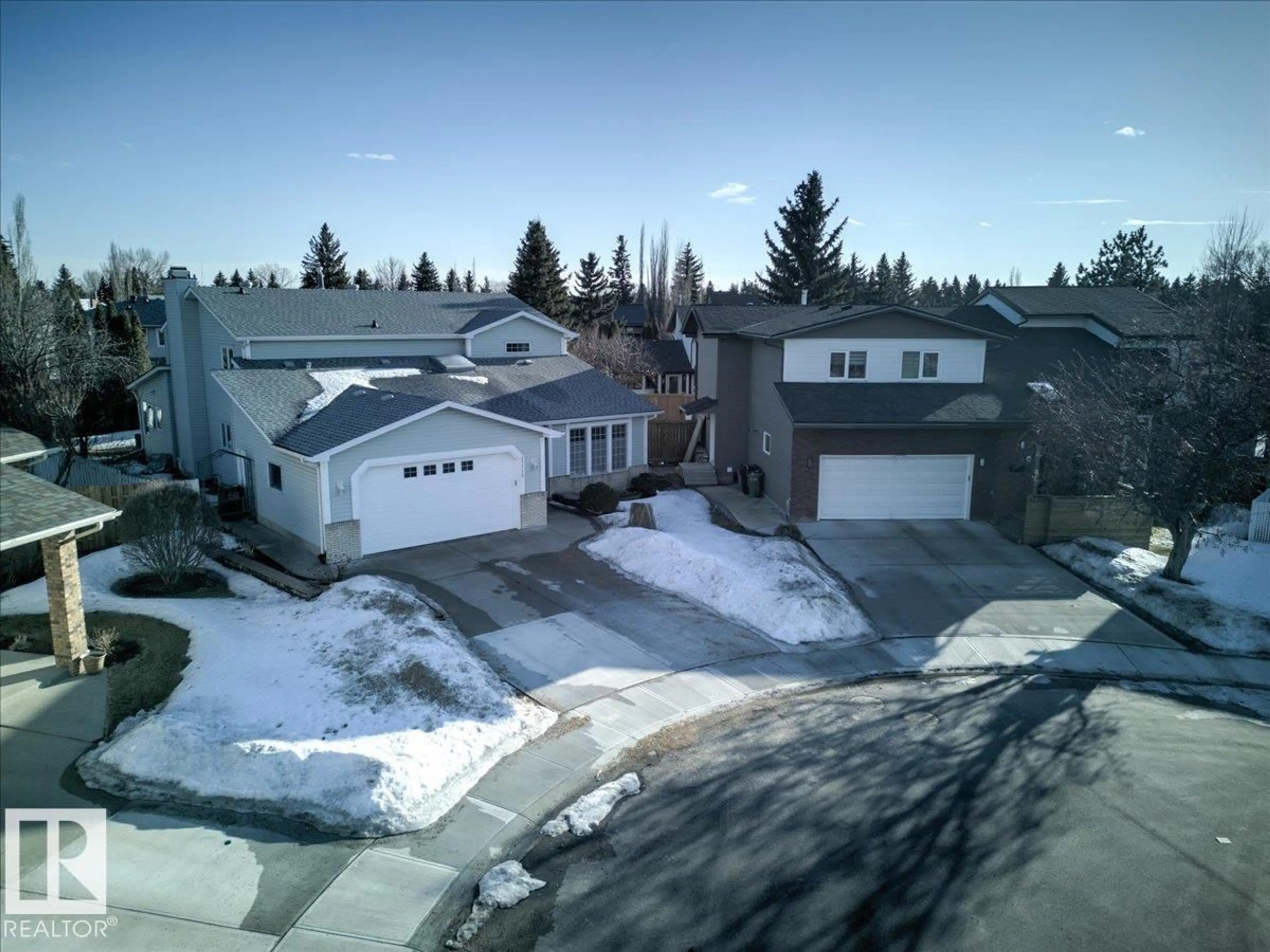 A pic from outside/outdoor area/front of a property/back of a property/a pic from drone, street for 17715 57 AV NW, Edmonton Alberta T6M1E1