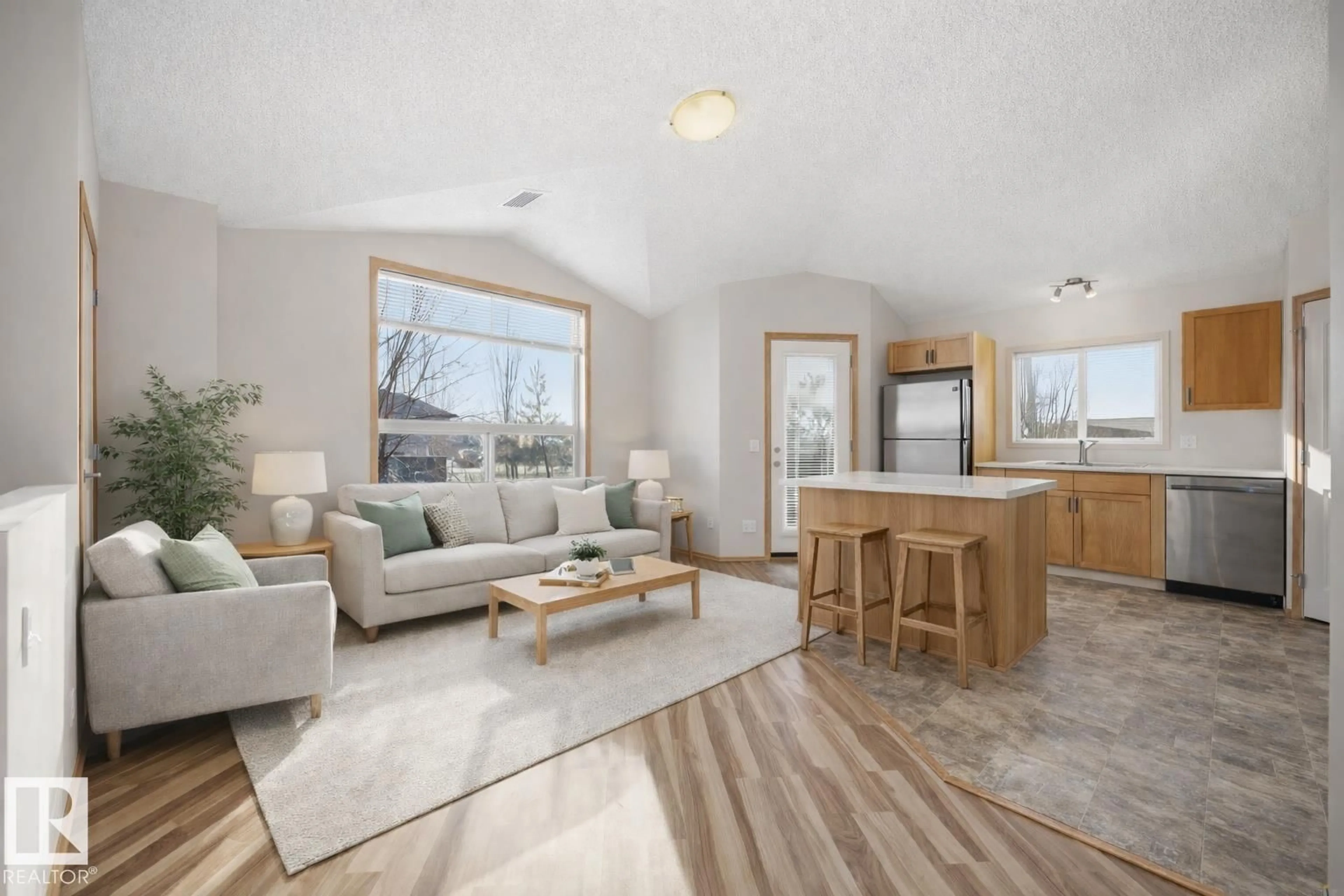 Living room with furniture, wood/laminate floor for #67 - 604 62 ST, Edmonton Alberta T6X0K4