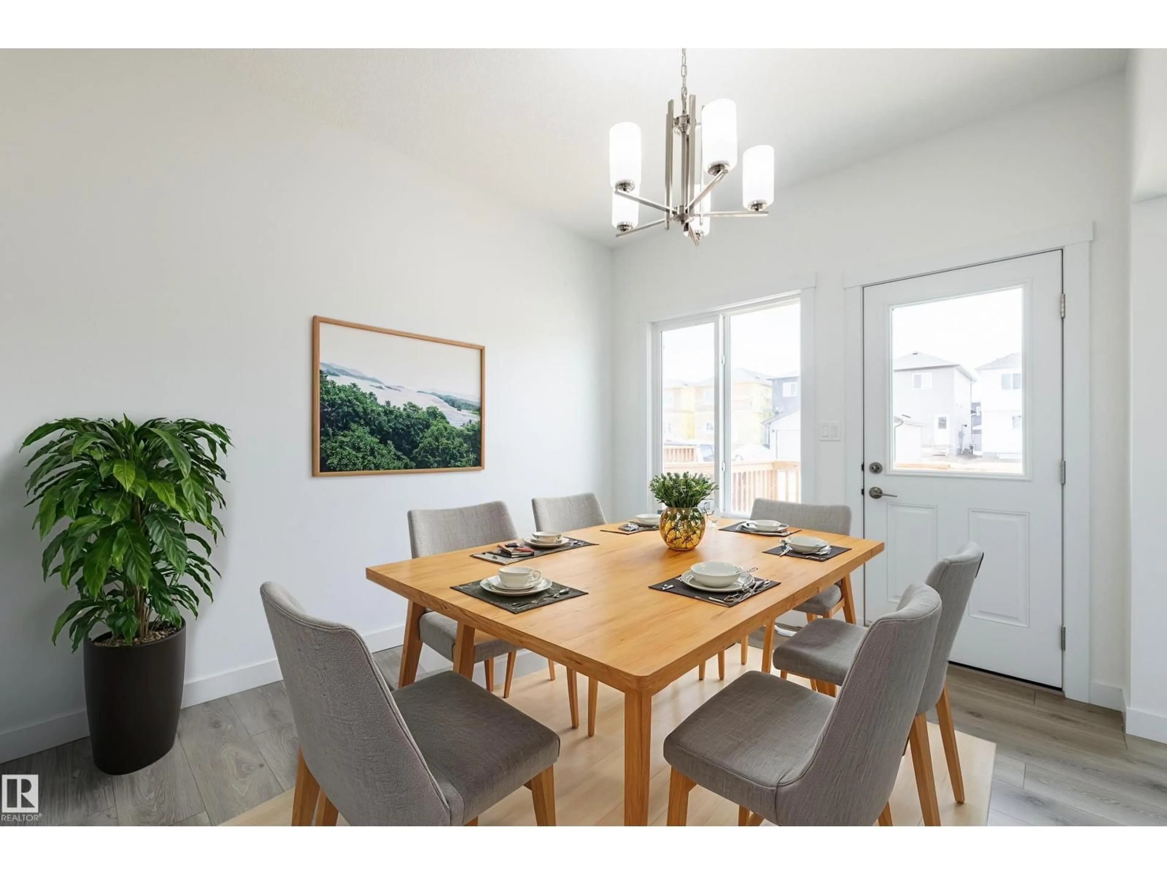 Dining room, wood/laminate floor for 600 ASHGROVE CI, Leduc Alberta T9E0K8