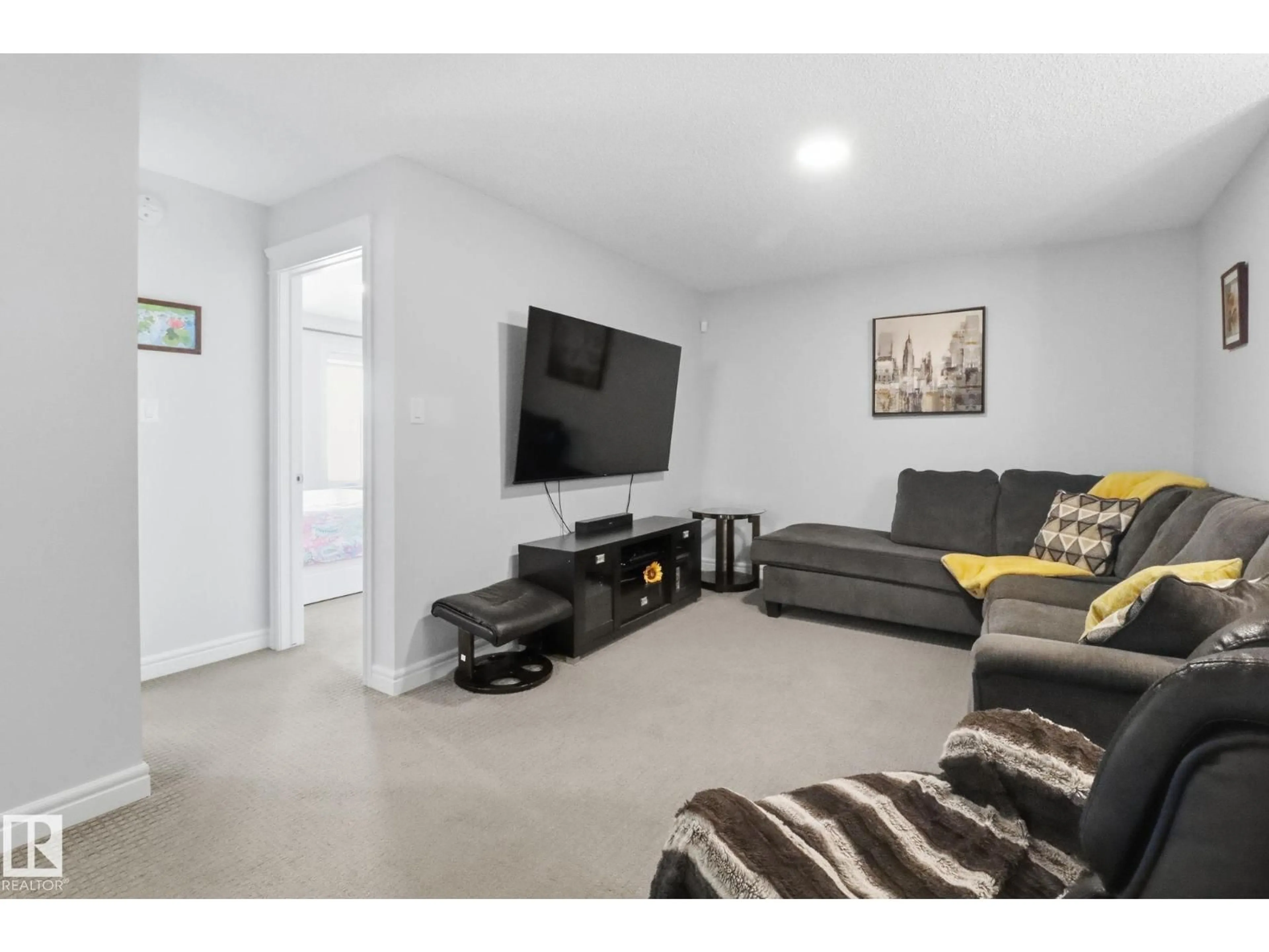 Living room with furniture, unknown for SW - 812 176 ST, Edmonton Alberta T6W2X3