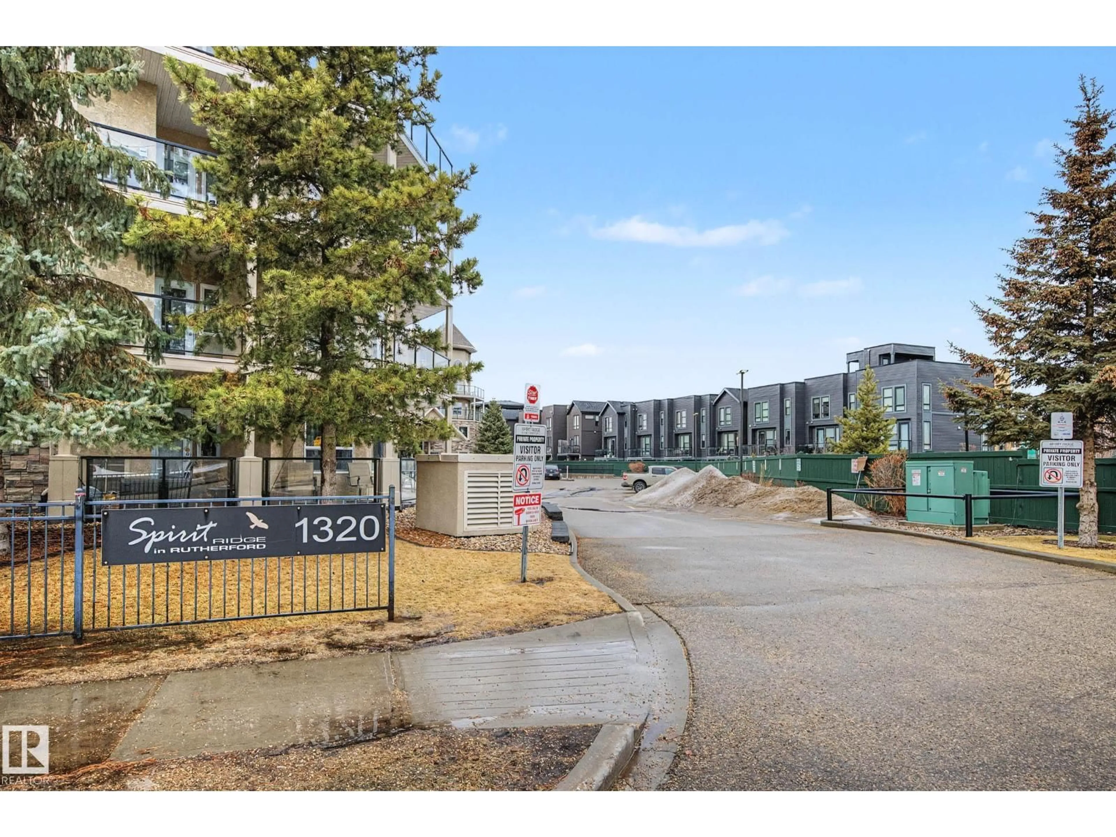 A pic from outside/outdoor area/front of a property/back of a property/a pic from drone, street for #422 - 1320 RUTHERFORD RD, Edmonton Alberta T6W0B6