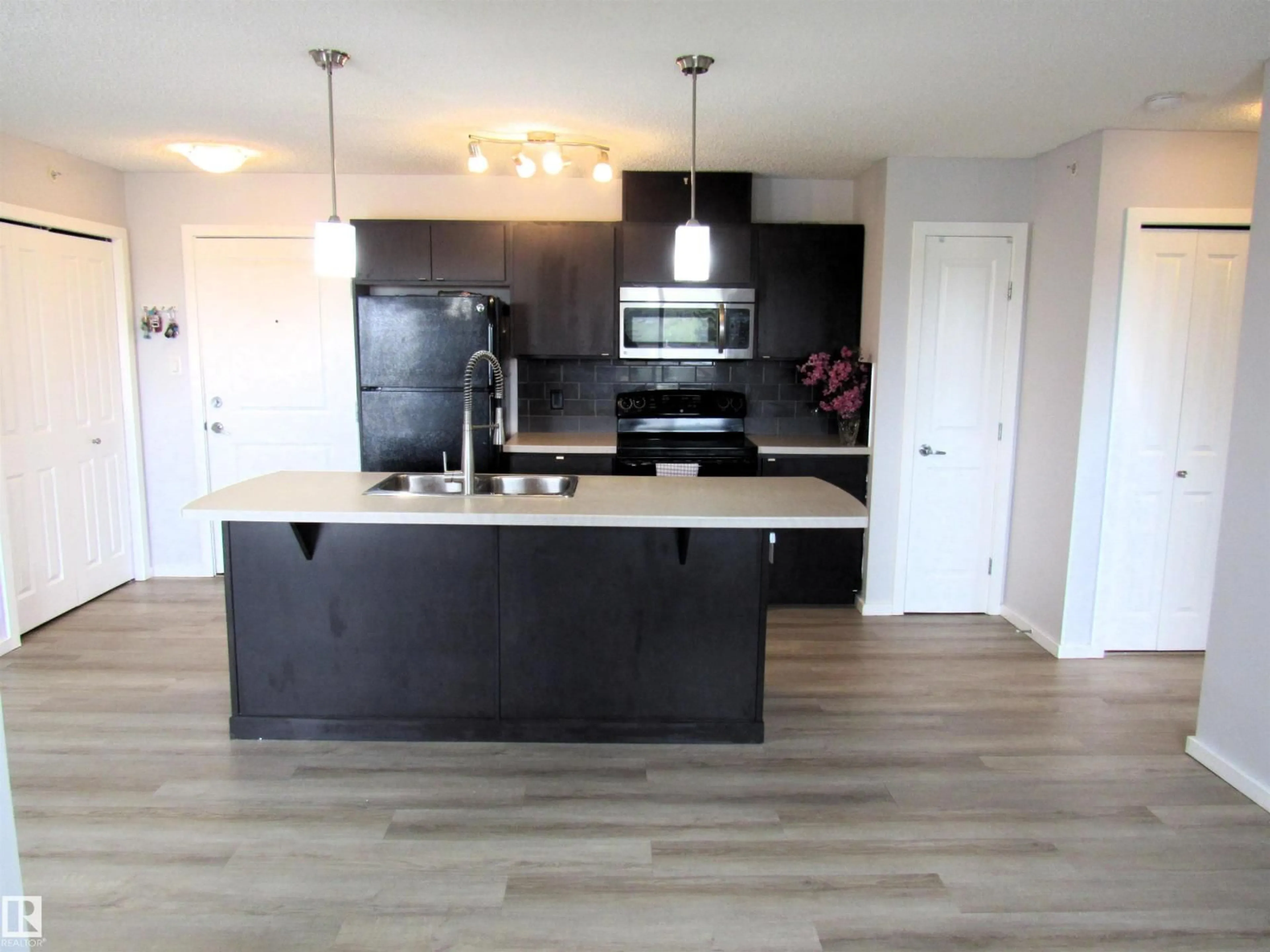 Open concept kitchen, unknown for #453 - 1196 HYNDMAN RD, Edmonton Alberta T5A0X8