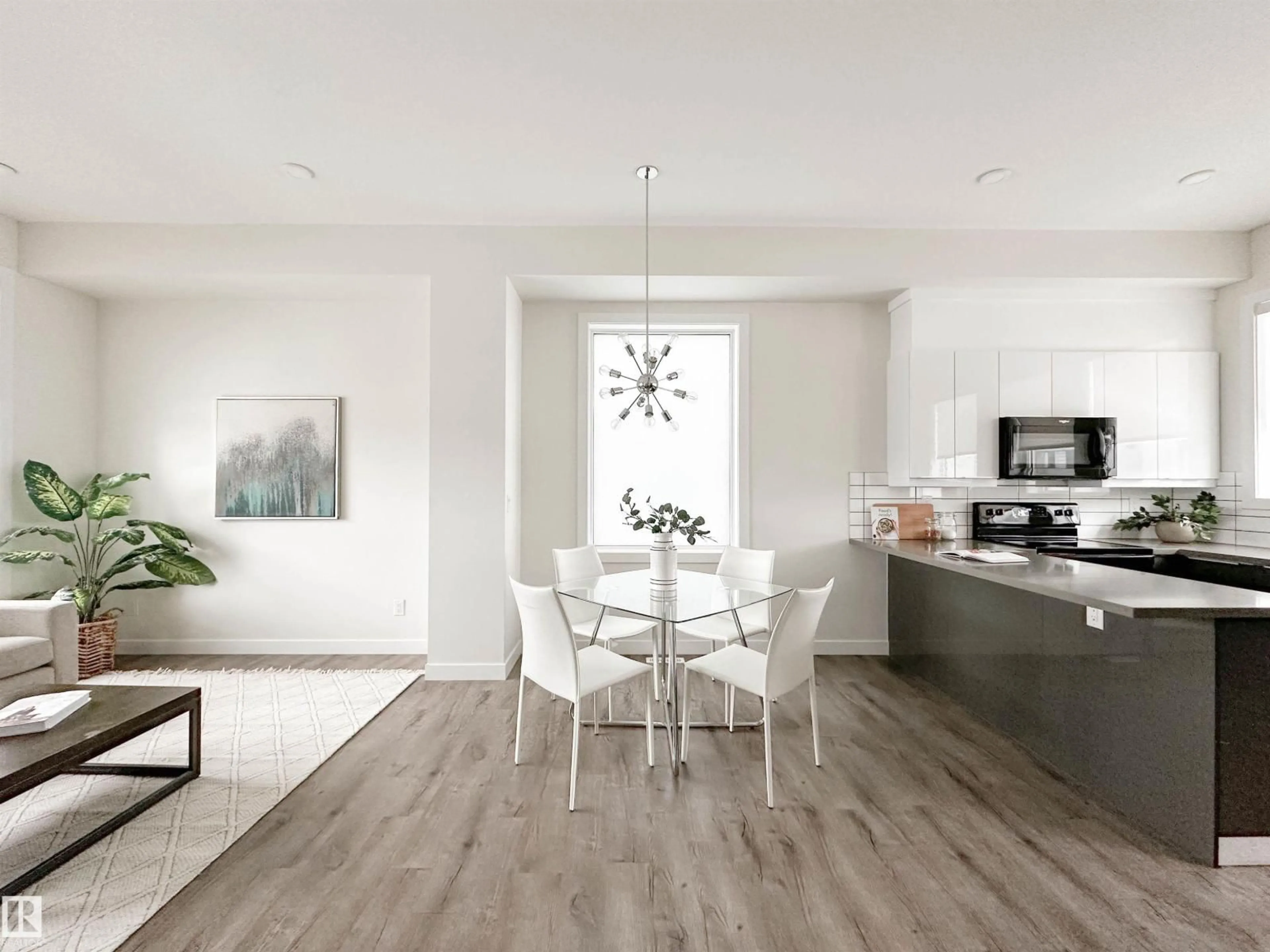 Open concept kitchen, wood/laminate floor for 5 - 130 ELEMENT DR, St. Albert Alberta T8N7X2