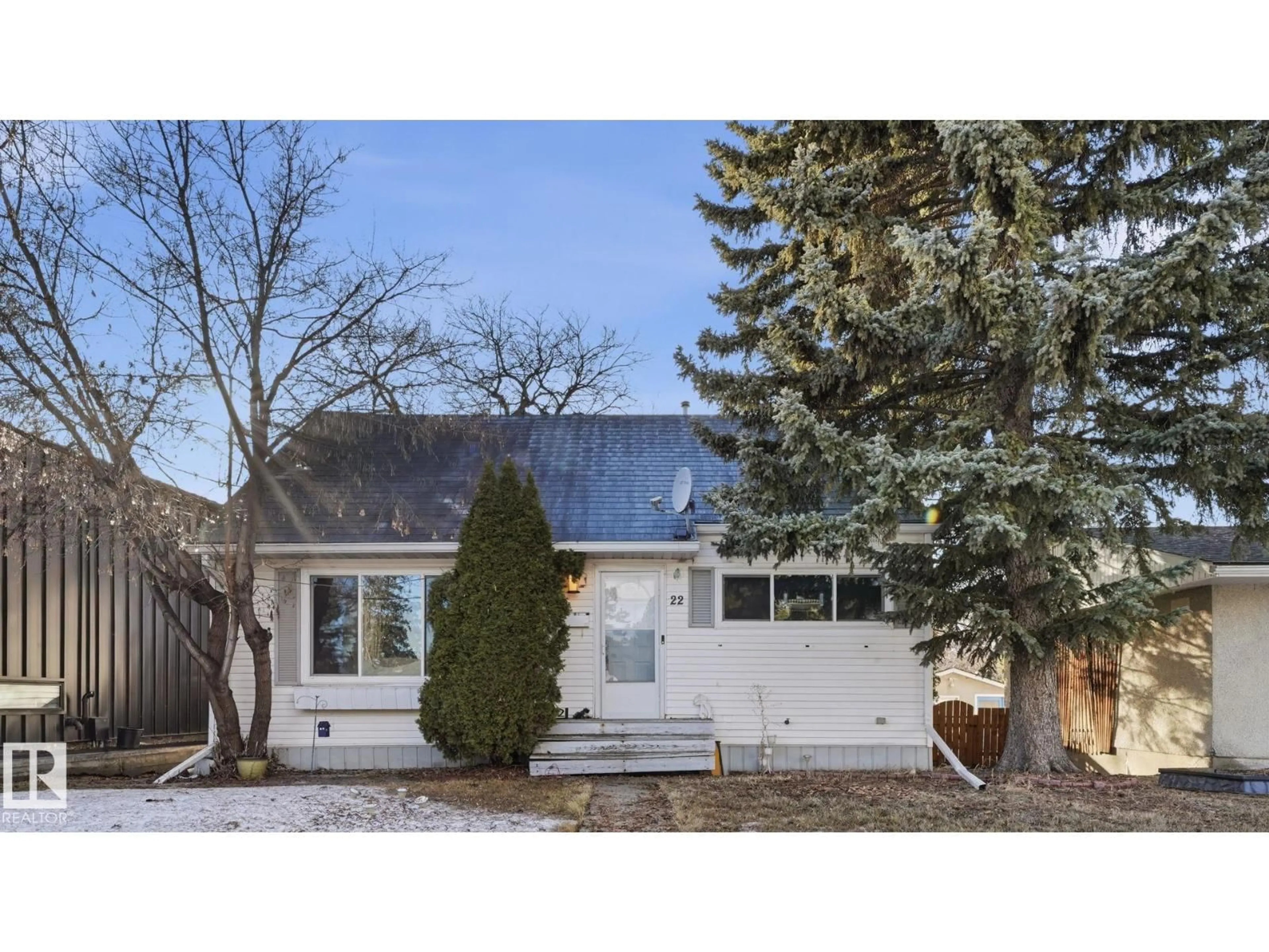 Home with vinyl exterior material, street for NW - 10922 117 ST, Edmonton Alberta T5N3N6