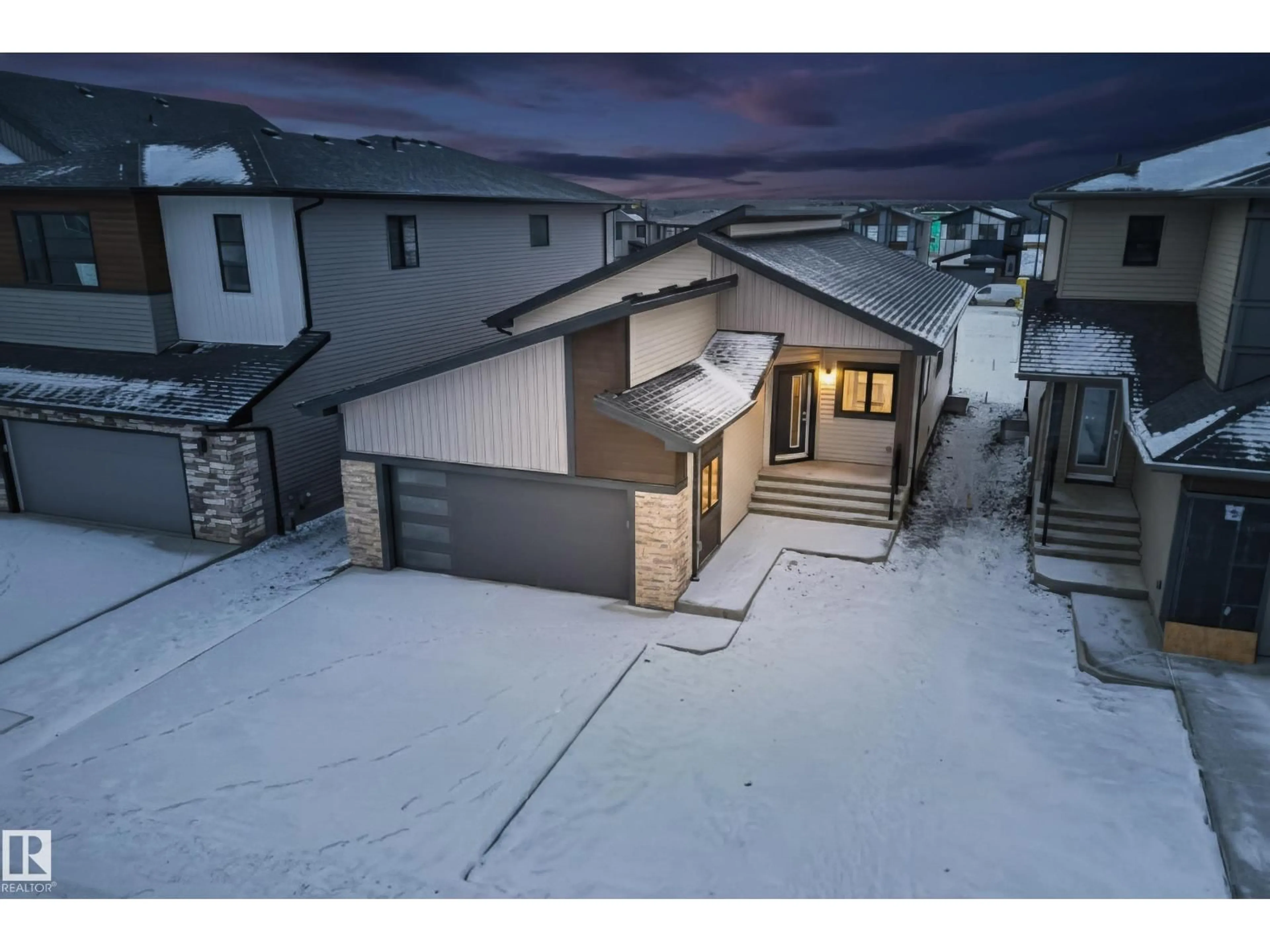 A pic from outside/outdoor area/front of a property/back of a property/a pic from drone, street for 7093 KIVIAQ CR, Edmonton Alberta T6W5N7