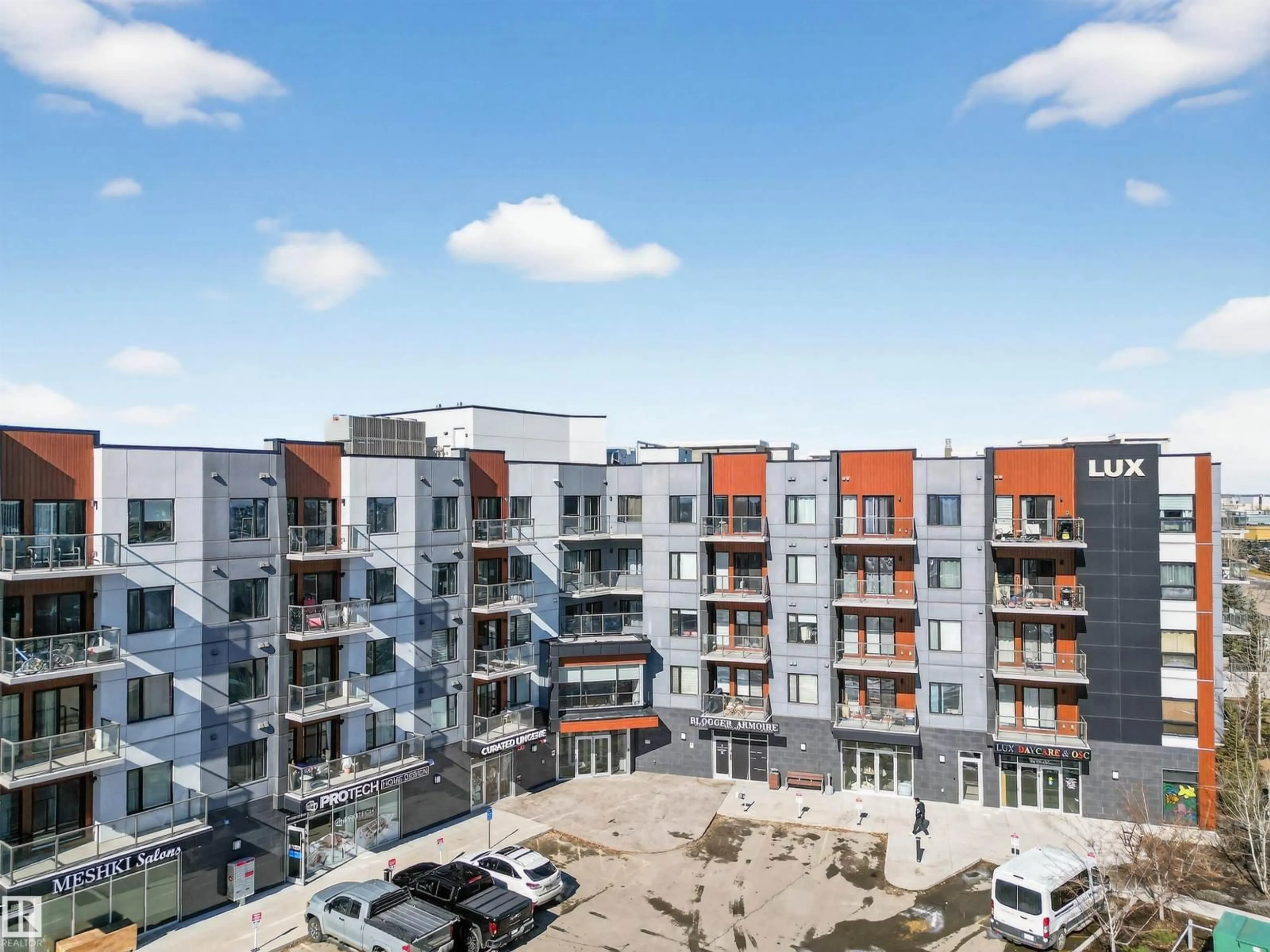 A pic from outside/outdoor area/front of a property/back of a property/a pic from drone, city buildings view from balcony for #401 - 1316 WINDERMERE WY, Edmonton Alberta T6W2J3