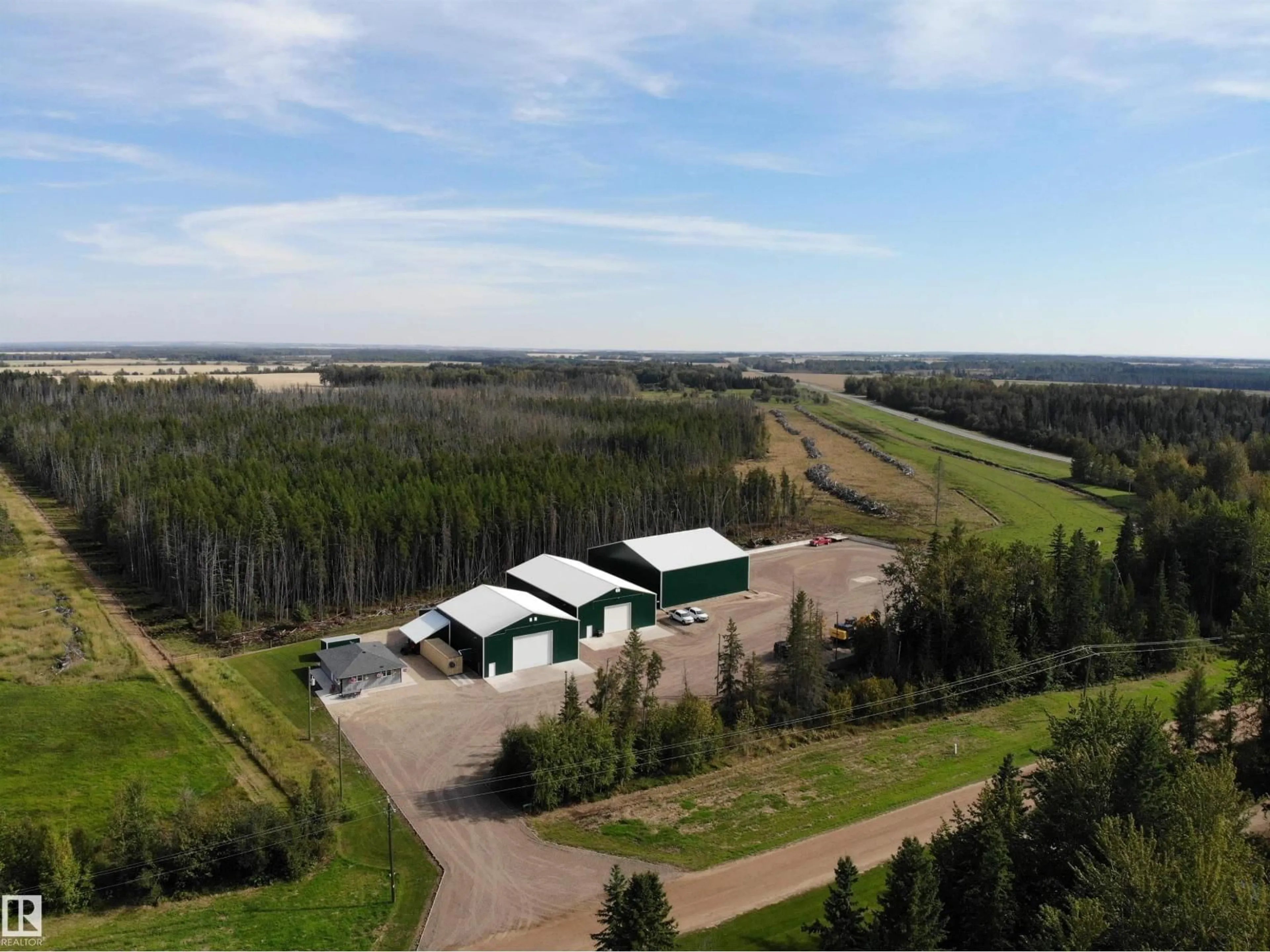 A pic from outside/outdoor area/front of a property/back of a property/a pic from drone, unknown for 33 HIGHWAY, Rural Barrhead County Alberta T7N1N2