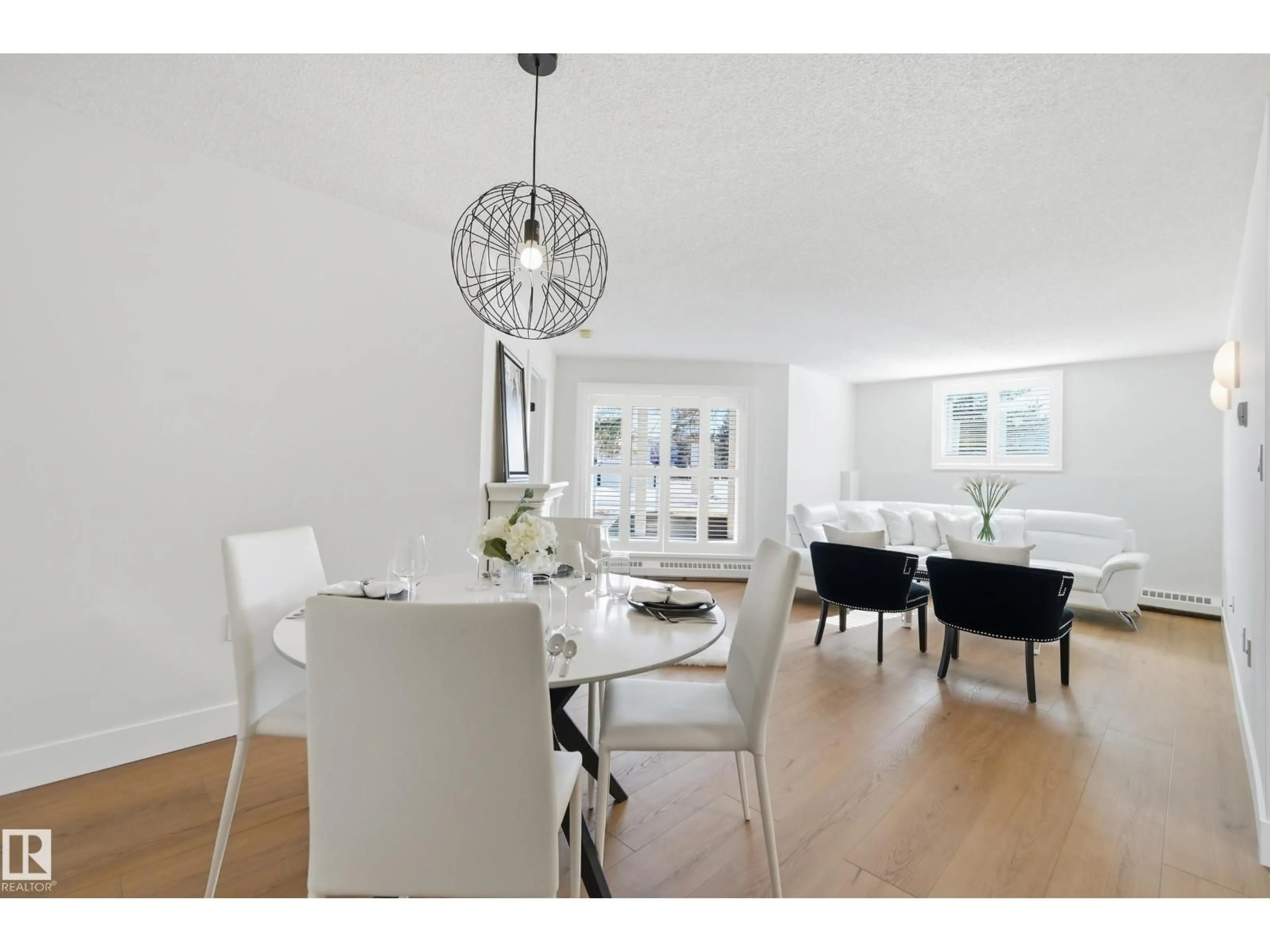 Dining room, wood/laminate floor for #102 - 9620 174 ST, Edmonton Alberta T5T6B9