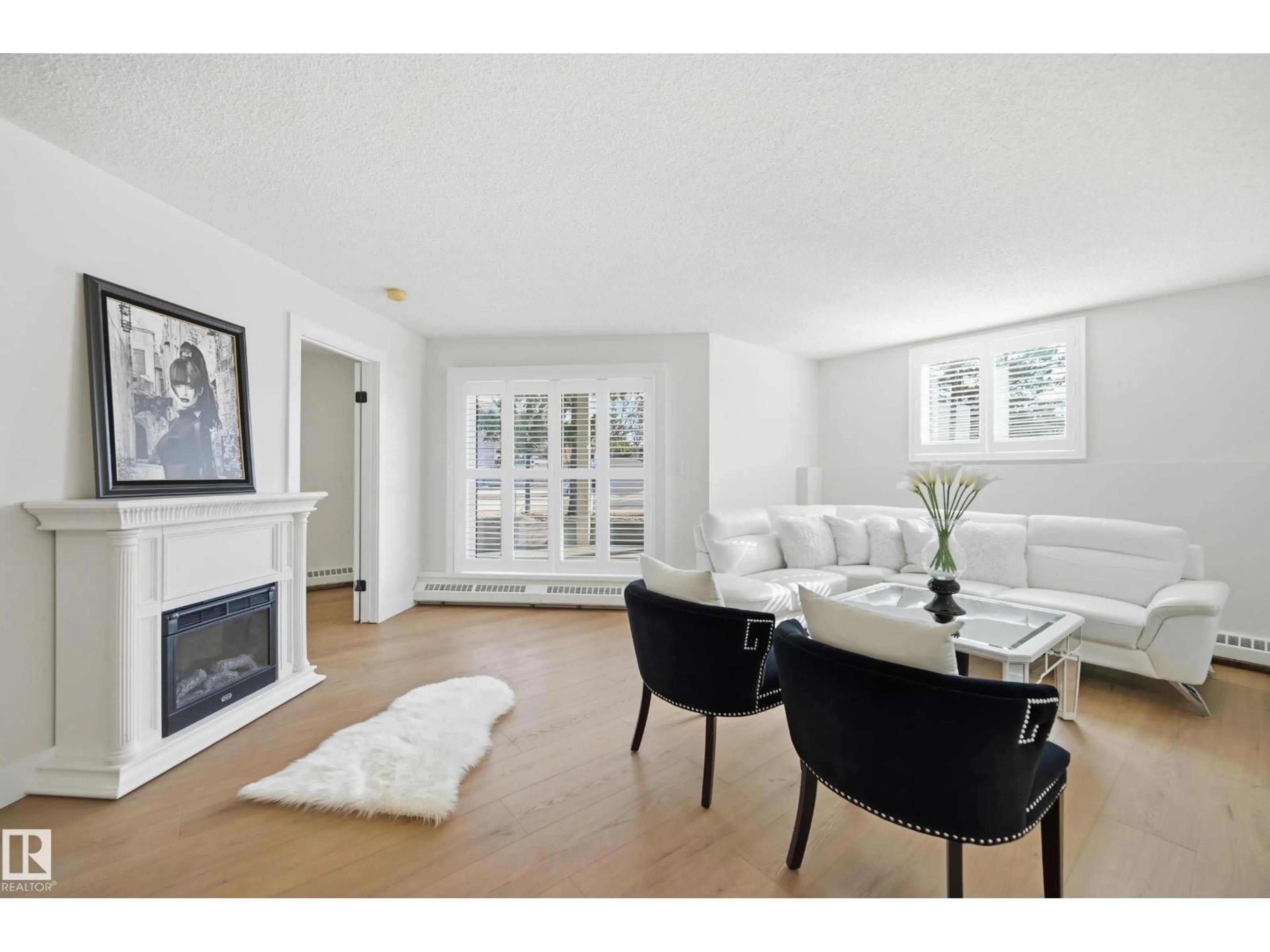 Living room with furniture, unknown for #102 - 9620 174 ST, Edmonton Alberta T5T6B9