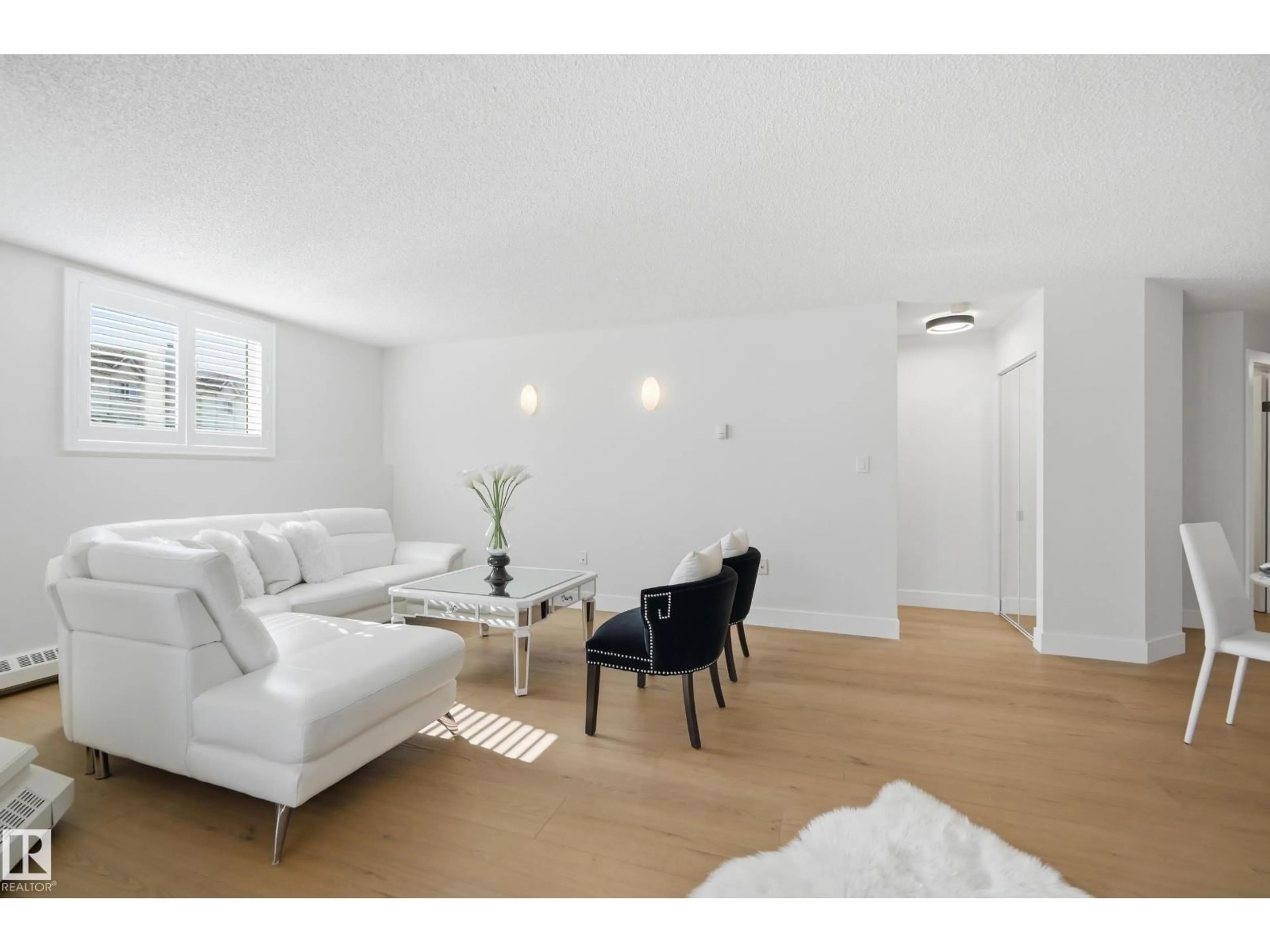 Living room with furniture, unknown for #102 - 9620 174 ST, Edmonton Alberta T5T6B9